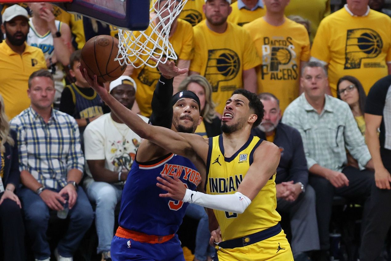 Indiana Pacers guard Tyrese Haliburton (0) shoots the ball against New York Knicks guard Josh Hart (3) in the fourth quarter during game six of the eastern conference finals for the 2025 NBA Playoffs at Gainbridge Fieldhouse.