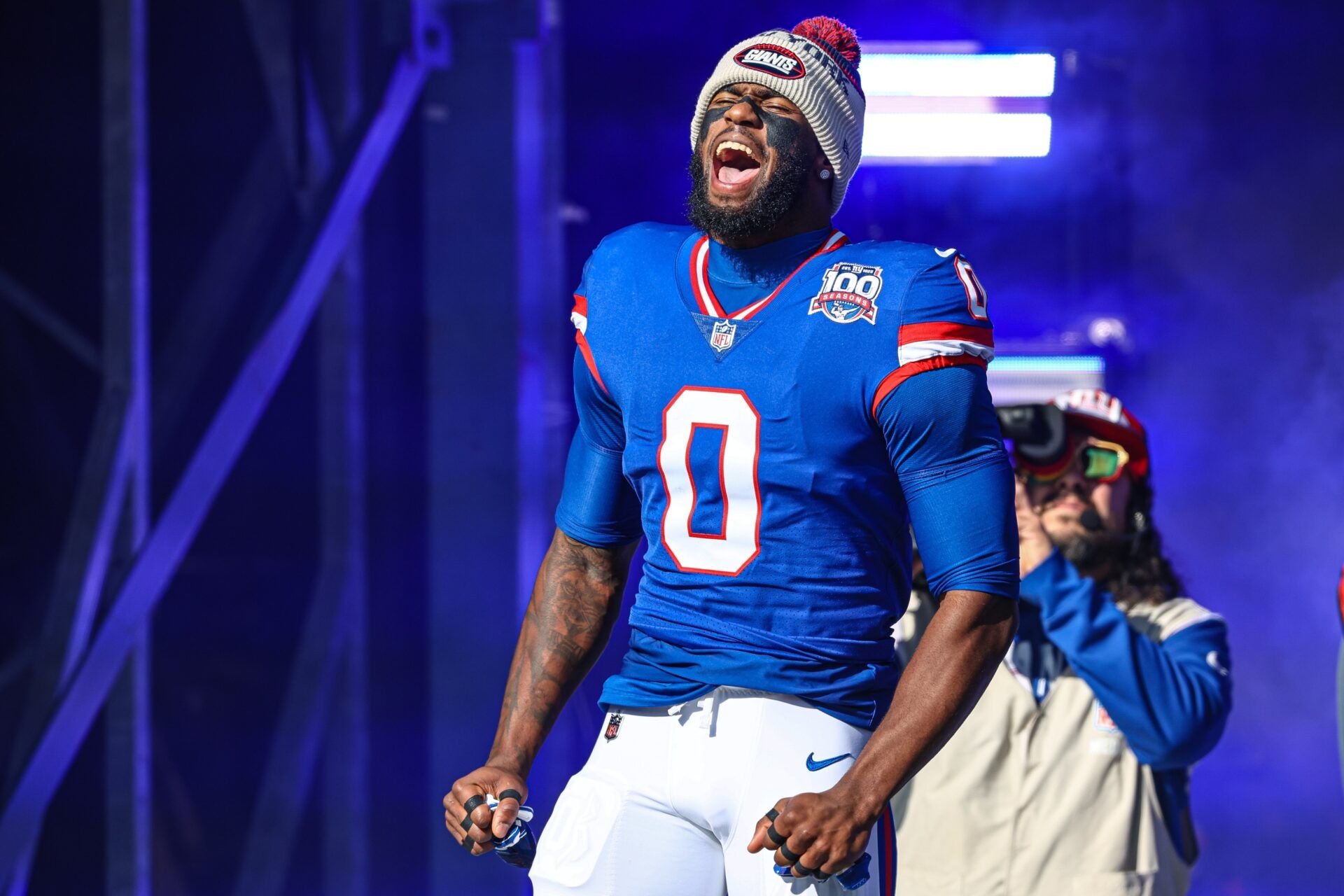 New York Giants linebacker Brian Burns (0) reacts during introductions before the game against the Washington Commanders at MetLife Stadium.