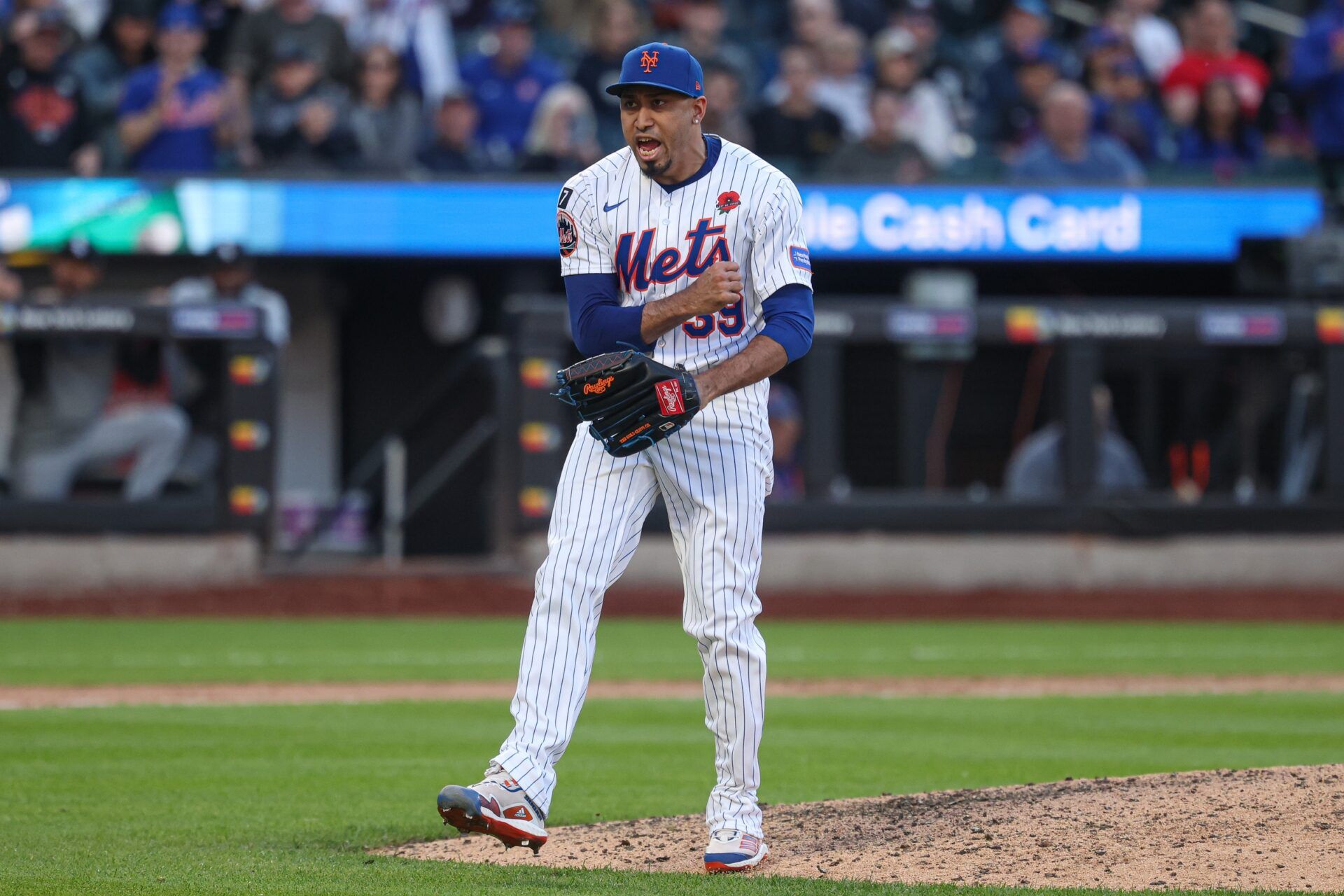 New York Mets relief pitcher Edwin Diaz (39) reacts after recording a strike out to end the top of the ninth inning against the Chicago White Sox at Citi Field.