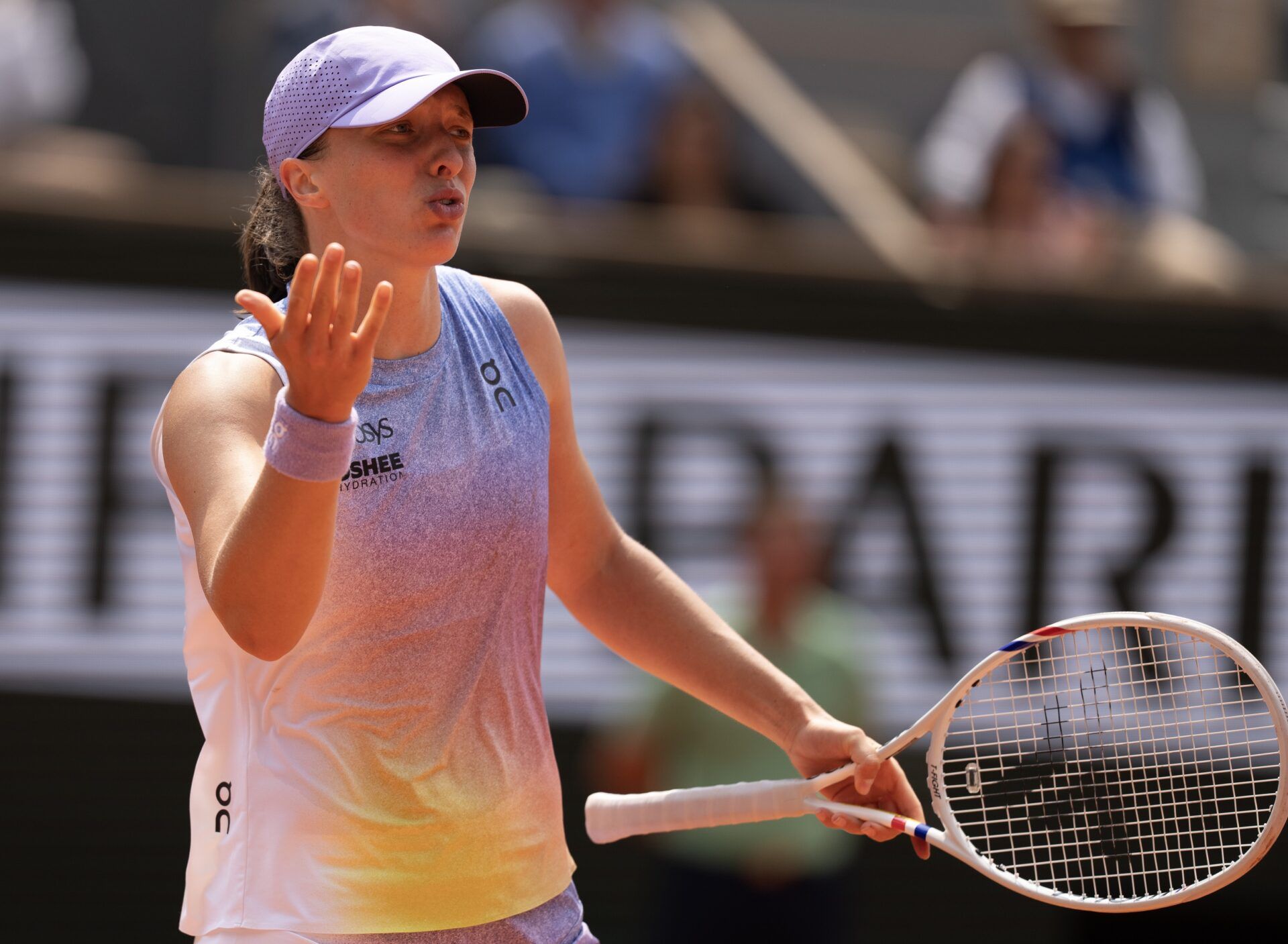 Iga Swiatek of Poland reacts to a point during her match against Elina Svitolina of Ukraine on day 10 at Roland Garros Stadium.