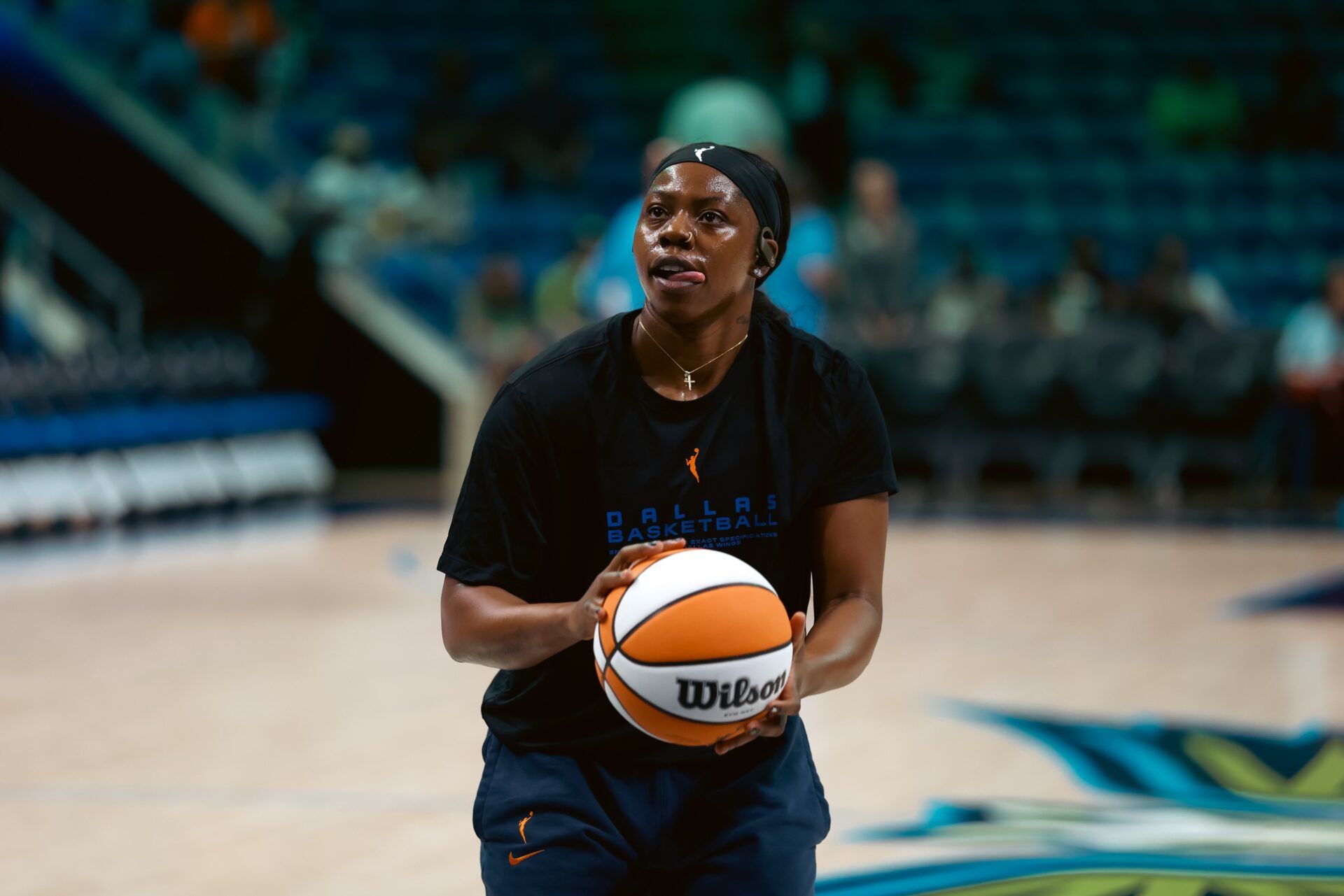 Dallas Wings guard Arike Ogunbowale (24) warms up before the game against the Chicago Sky at College Park Center.