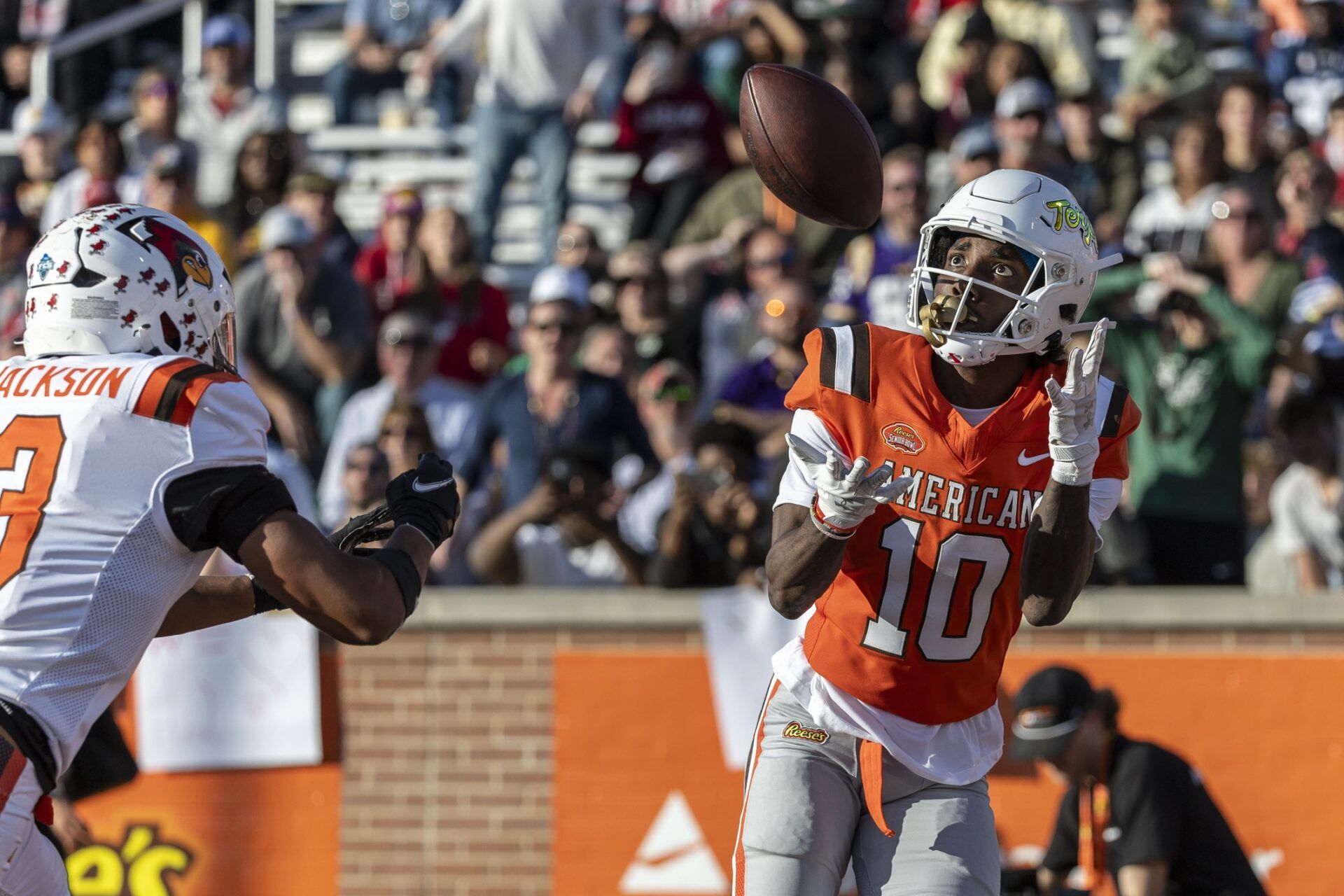 American team wide receiver Tai Felton of Maryland (10) grabs a touchdown pass against the National team during the second half of the 2025 Senior Bowl at Hancock Whitney Stadium.