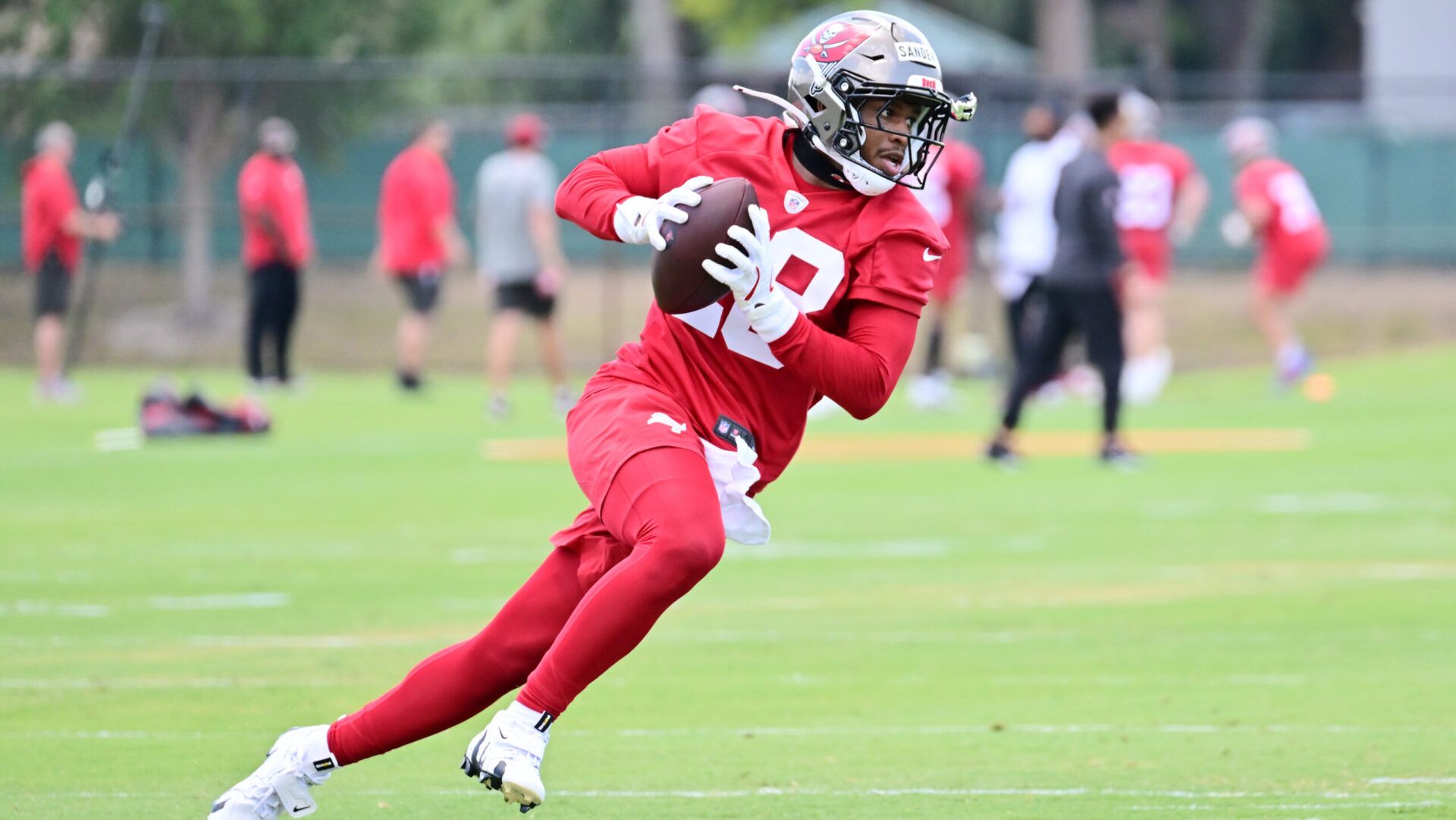 TAMPA, FLORIDA - MAY 09: Shilo Sanders #28 of the Tampa Bay Buccaneers works out during the 2025 Tampa Bay Buccaneers Rookie Mini-Camp at AdventHealth Training Center on May 09, 2025 in Tampa, Florida. (Photo by Julio Aguilar/Getty Images)