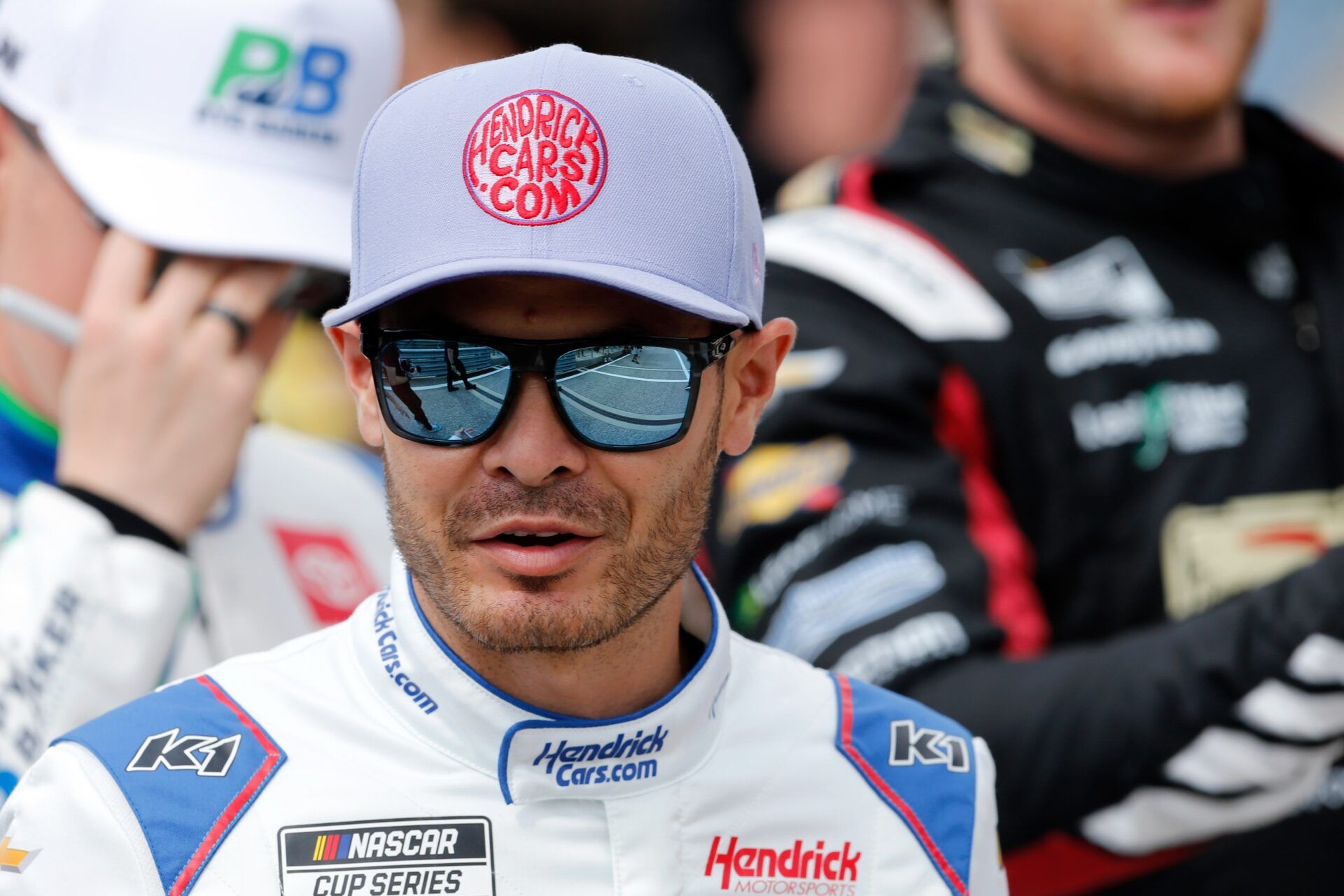 NASCAR Cup Series driver Kyle Larson (5) walks into EchoPark Automotive Grand Prix for driver introductions at Circuit of the Americas.