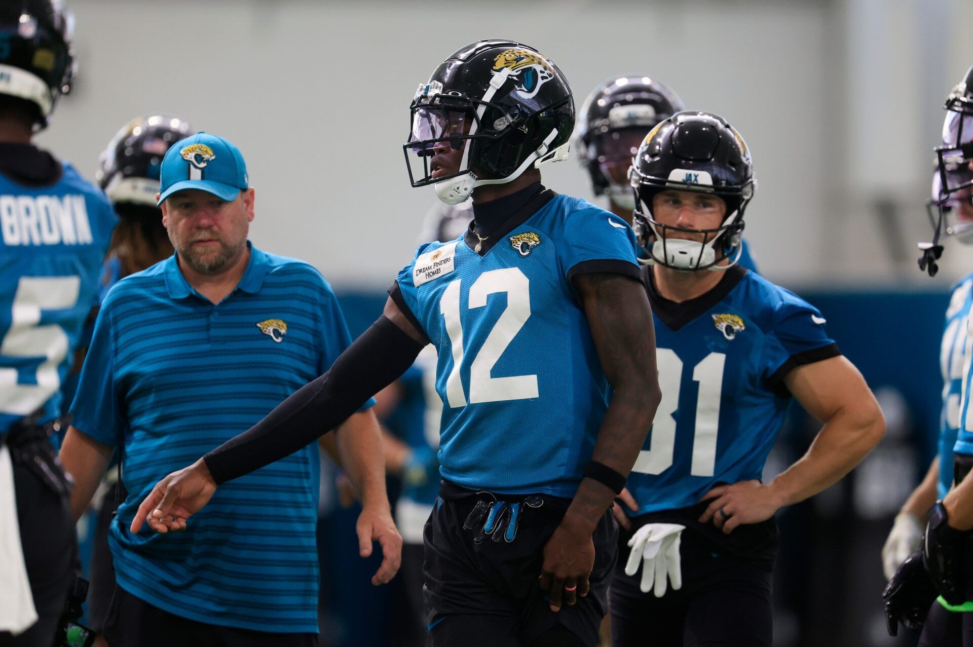 Jacksonville Jaguars wide receiver Travis Hunter (12) looks on during the 10th organized team activity at Miller Electric Center Wednesday, June 4, 2025 in Jacksonville, Fla. [Corey Perrine/Florida Times-Union]