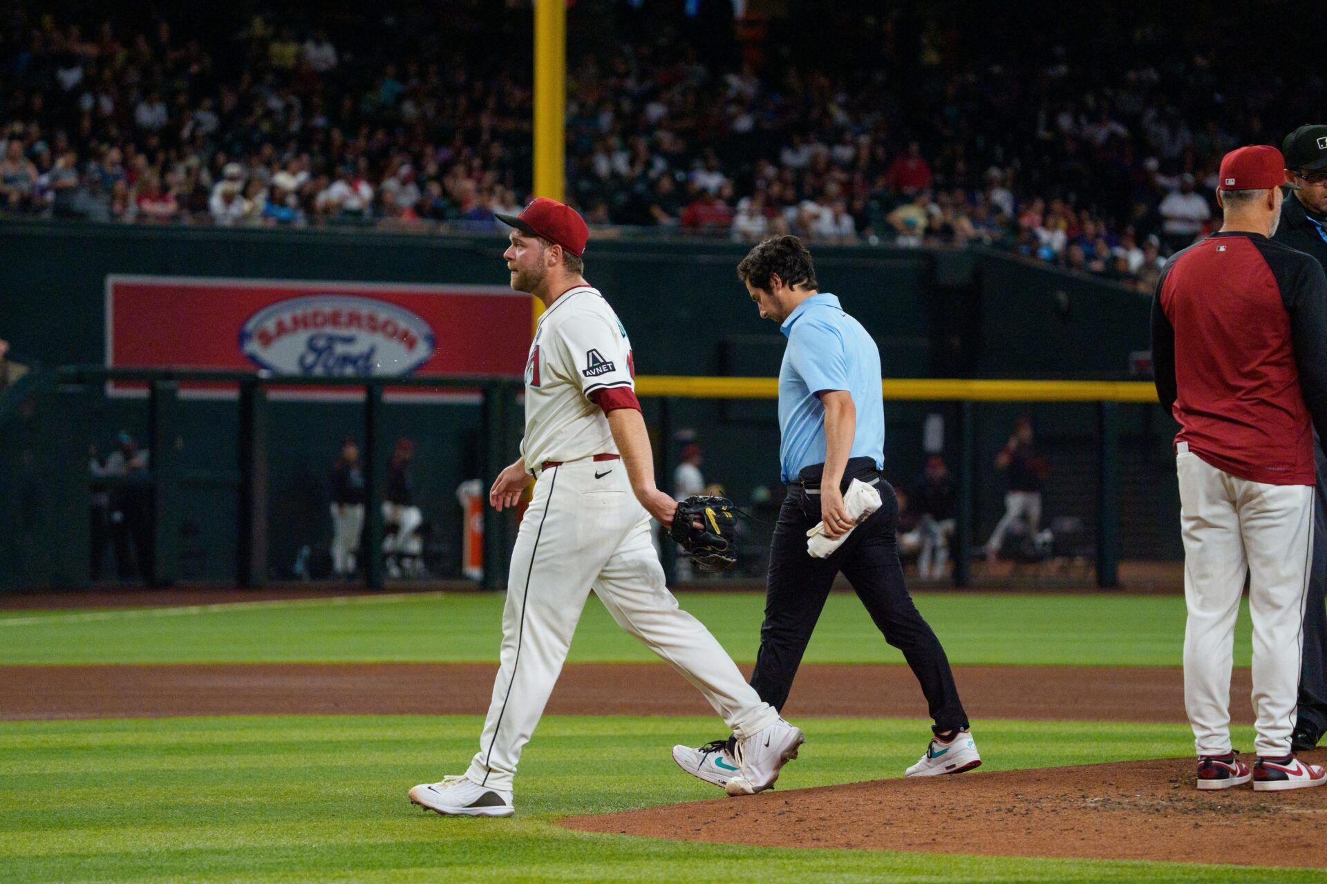Arizona Diamondbacks starting pitcher Corbin Burnes (39) reacts after an injury in the fith inning and leaves the field against the Washington Nationals at Chase Field.