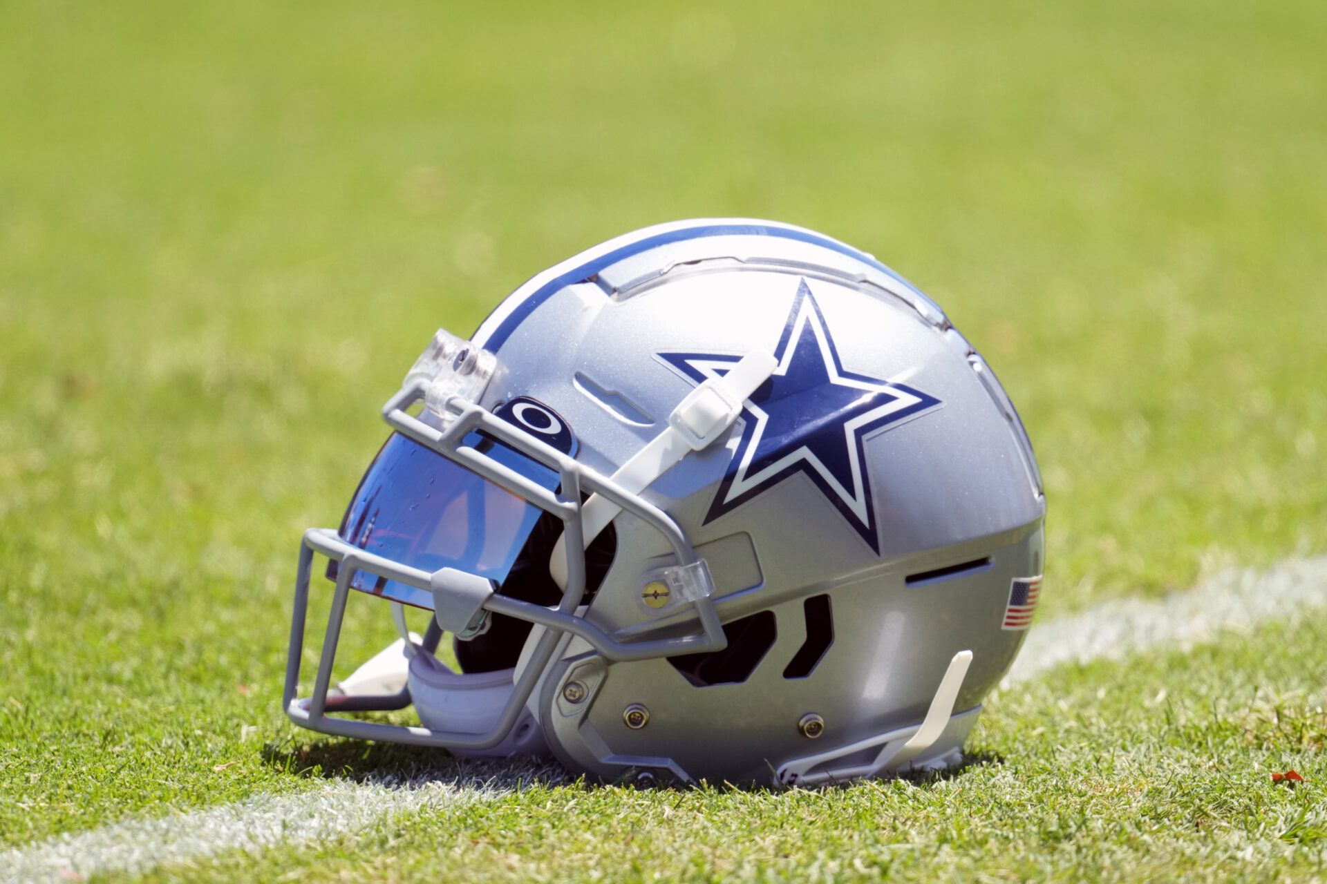 A Dallas Cowboys helmet with Oakley visor at training camp at Marriott Residence Inn-River Ridge Playing Fields.
