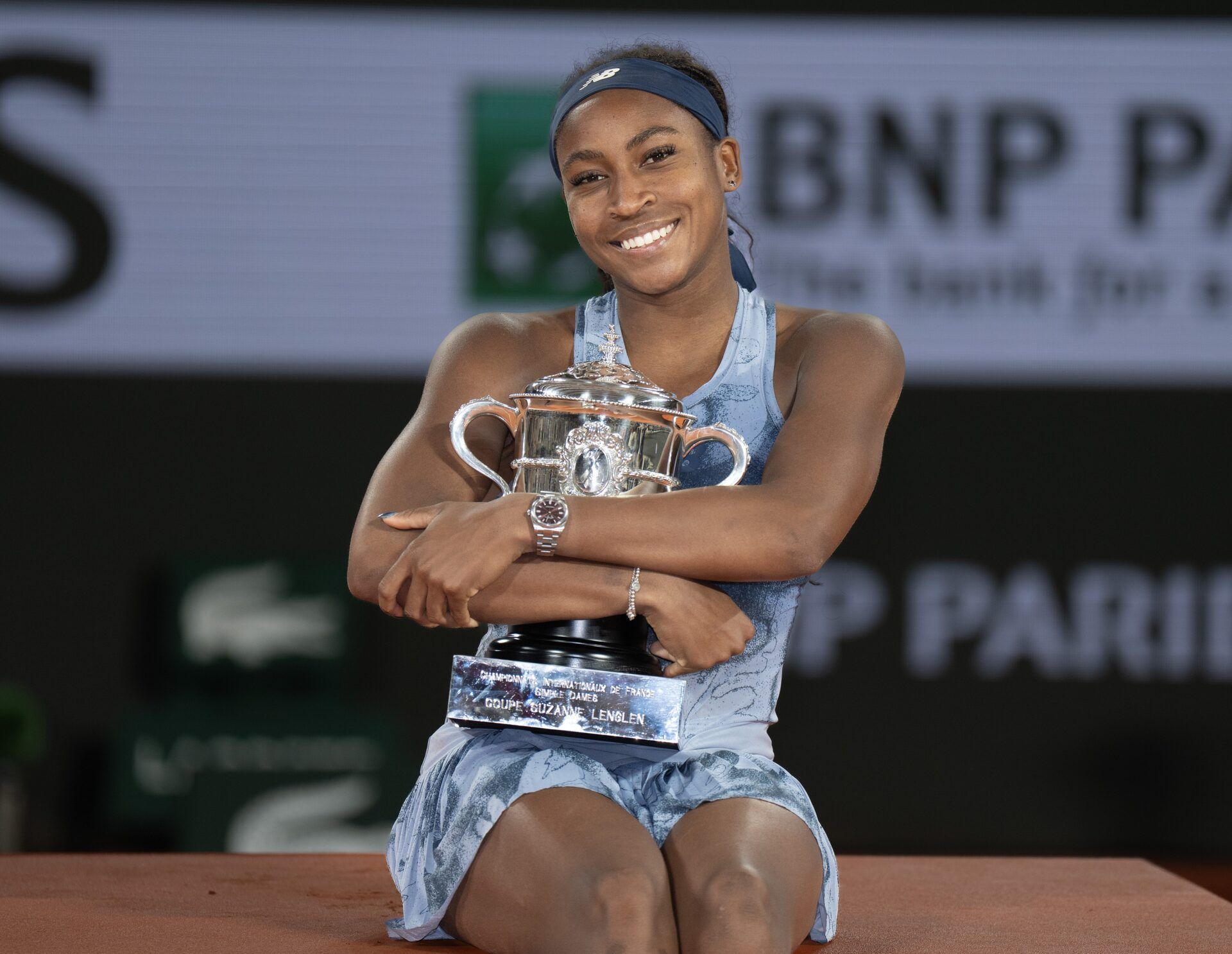 Coco Gauff of the United States poses with the trophy after winning the womenÕs singles final against Aryna Sabalenka on day 14 at Roland Garros Stadium.