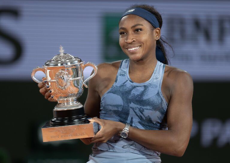 Coco Gauff of the United States poses with the trophy after winning the womenÕs singles final against Aryna Sabalenka on day 14 at Roland Garros Stadium.