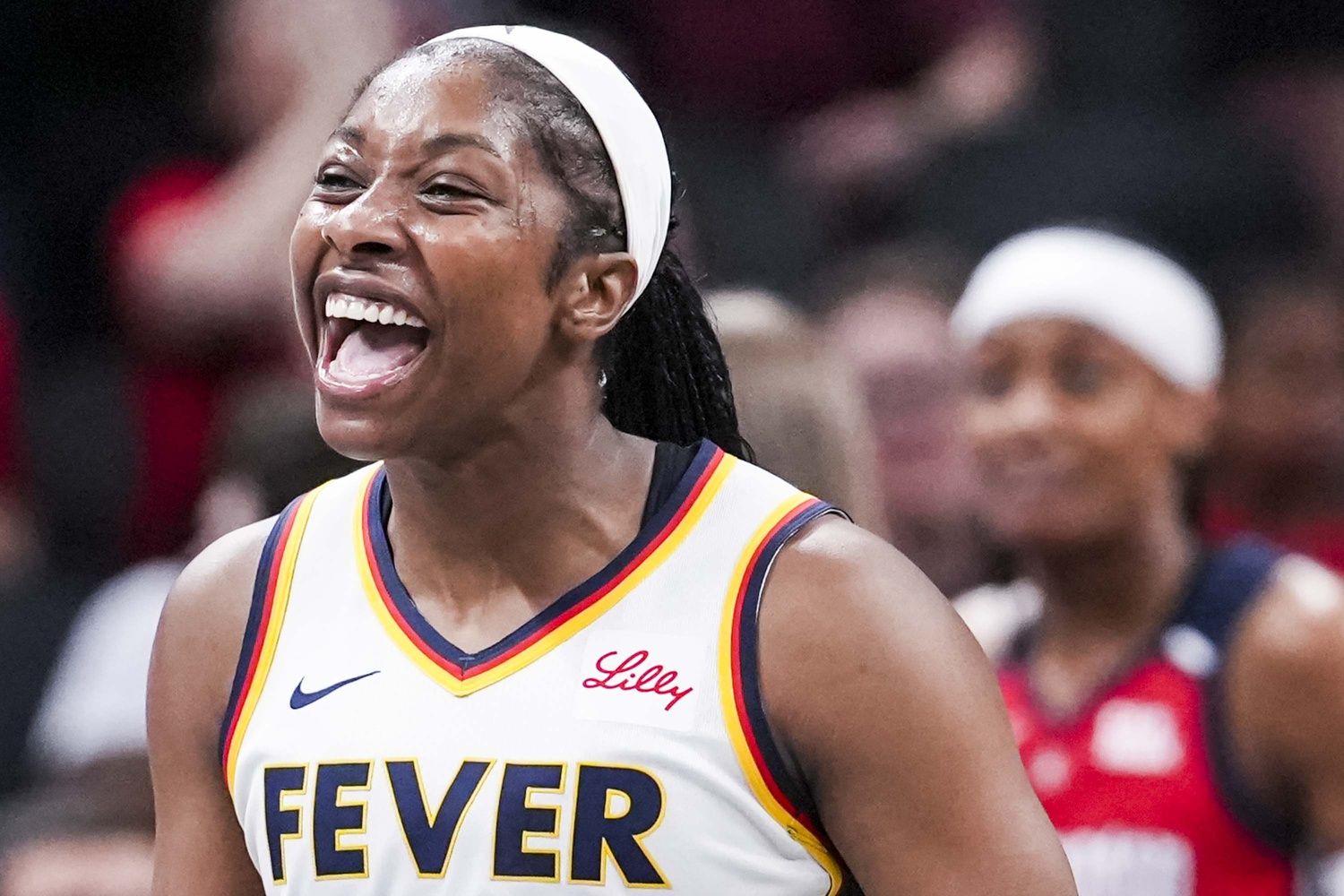 Indiana Fever guard Aari McDonald (2) celebrates during a game between the Indiana Fever and the Washington Mystics at Gainbridge Fieldhouse in Indianapolis.