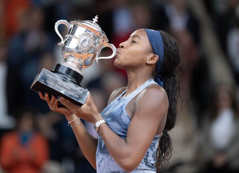 Coco Gauff of the United States kisses the trophy after winning the womenÕs singles final against Aryna Sabalenka on day 14 at Roland Garros Stadium.