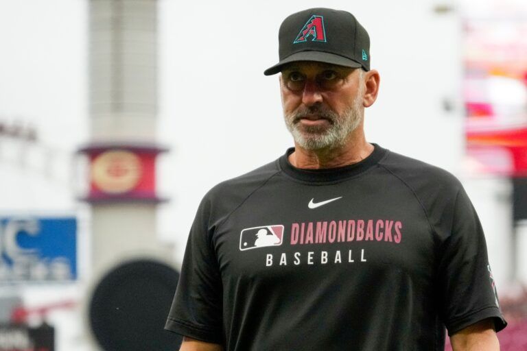 Arizona Diamondbacks manager Torey returns to the dugout after a pitching change in the seventh inning of the MLB National League game between the Cincinnati Reds and the Arizona Diamondbacks at Great American Ball Park in downtown Cincinnati on Saturday, June 7, 2025. The Reds won, 13-1.