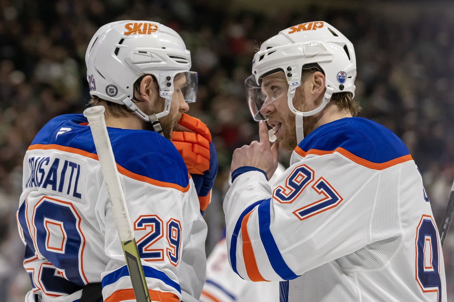 Edmonton Oilers forward Leon Draisaitl (29) and forward Connor McDavid (97) talk before a face-off against the Minnesota Wild during the third period at Xcel Energy Center.