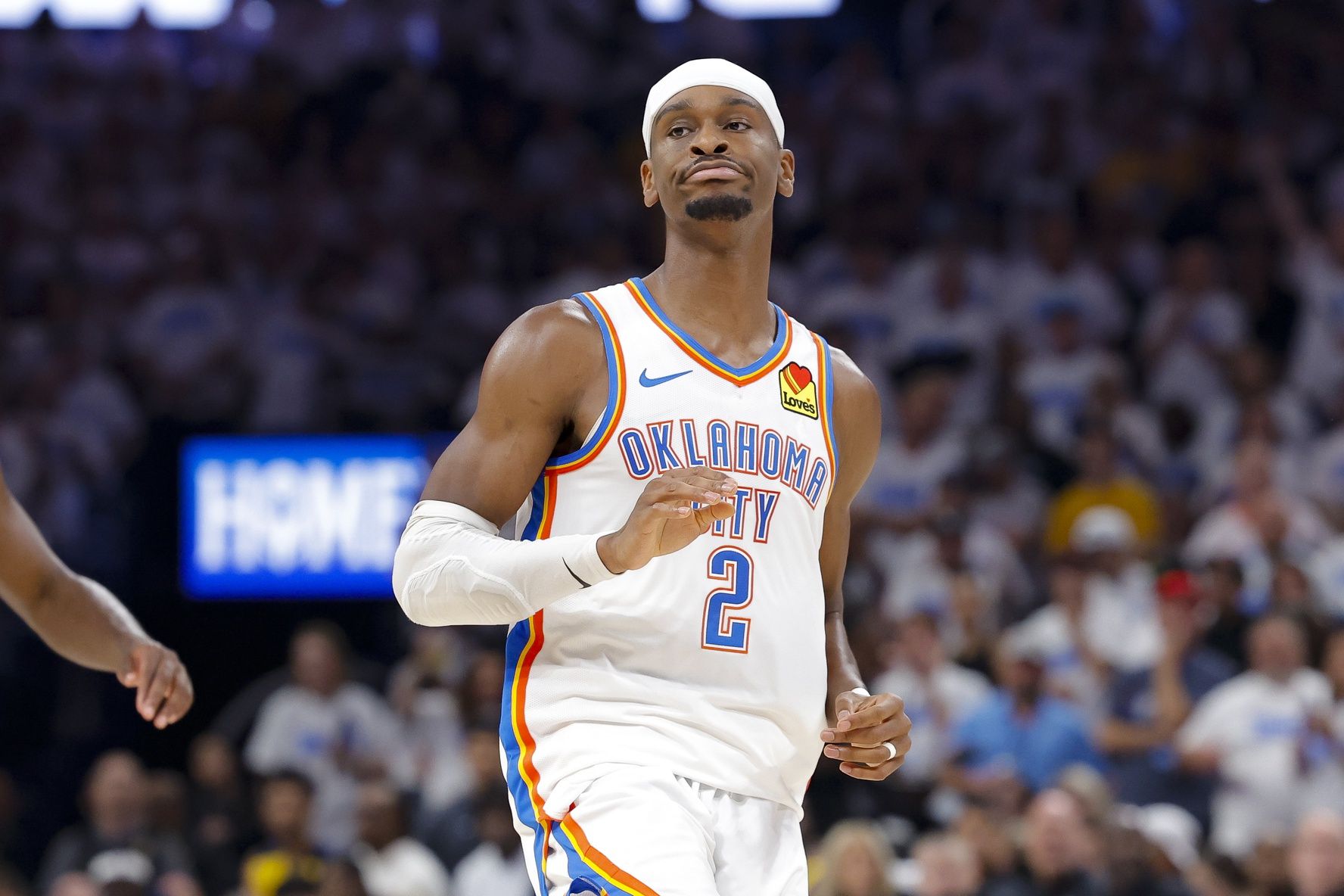 Oklahoma City Thunder guard Shai Gilgeous-Alexander (2) reacts to making a basket against the Indiana Pacers during the third quarter during game one of the 2025 NBA Finals at Paycom Center.