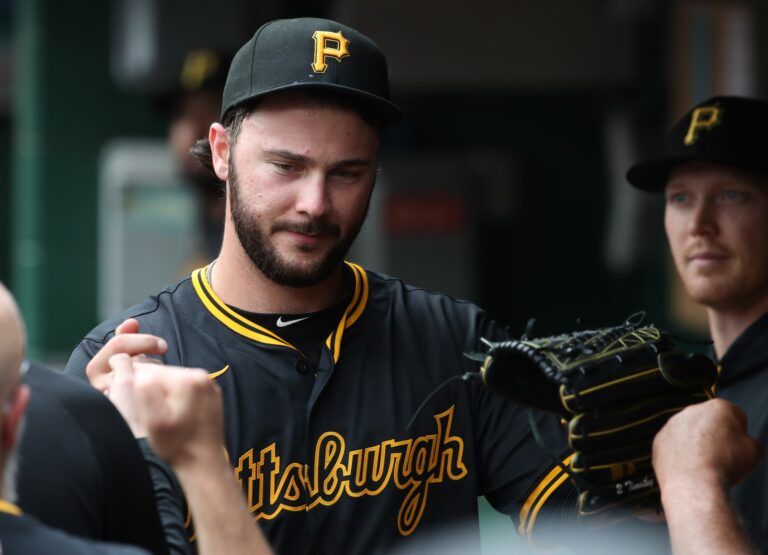 Pittsburgh Pirates starting pitcher Paul Skenes (30) celebrates in the dugout after pitching 7 2/3 innings without surrendering an earned run against the Philadelphia Phillies during the eighth inning at PNC Park.