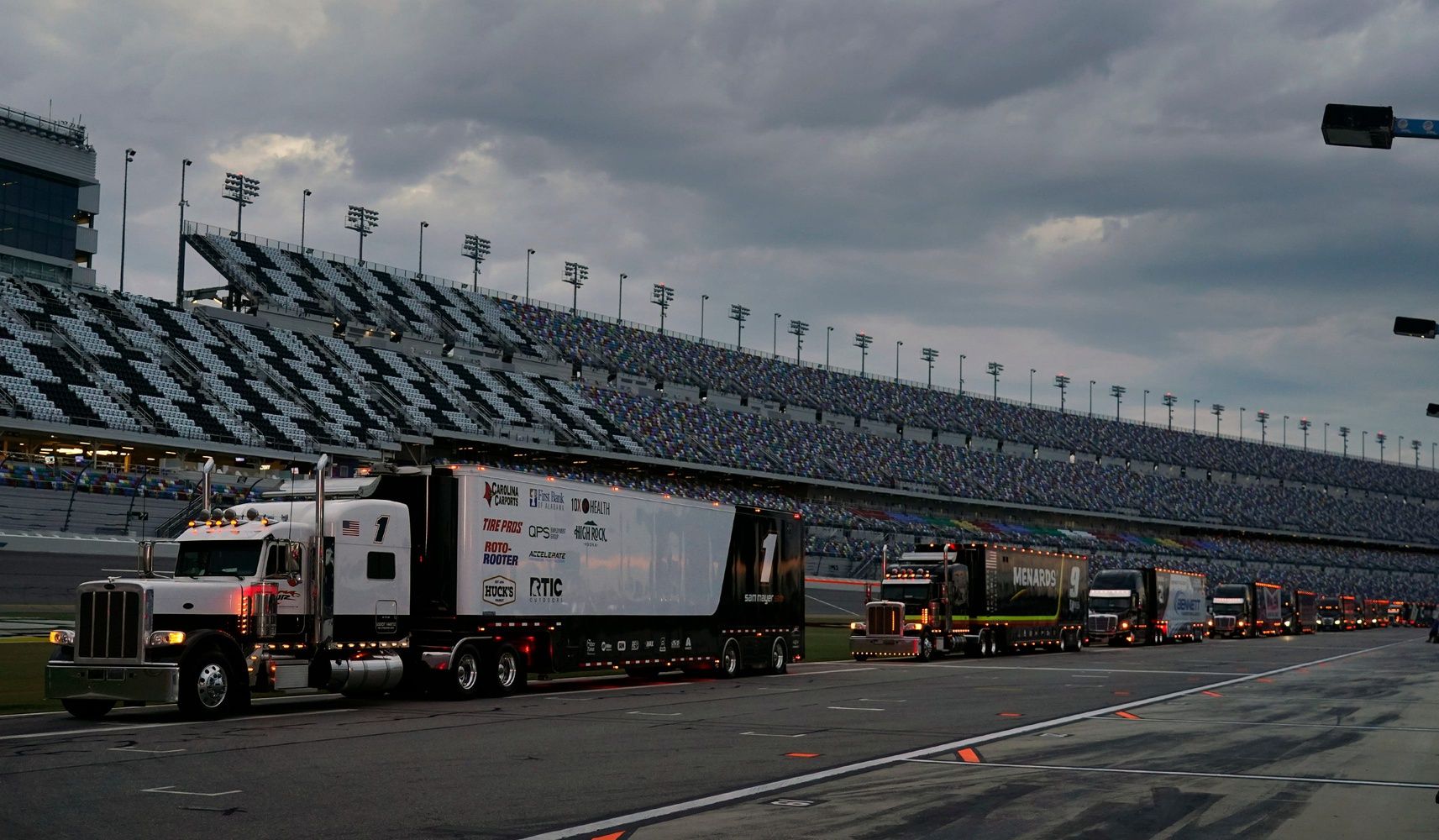 NASCAR Xfinity Series haulers and teams arrive at Daytona International Speedway in preparation for racing this week, Thursday, Aug. 22, 2024.