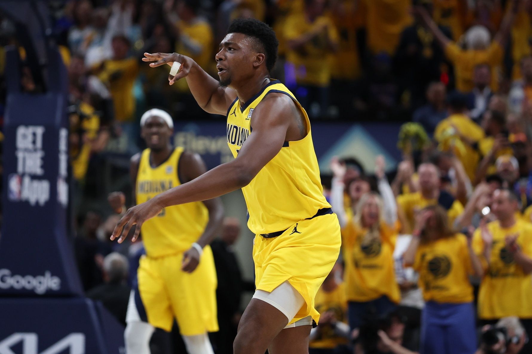 Indiana Pacers center Thomas Bryant (3) celebrates after a three-point basket against the New York Knicks in the third quarter during game six of the eastern conference finals for the 2025 NBA Playoffs at Gainbridge Fieldhouse.