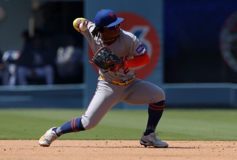 New York Mets second baseman Luisangel Acuna (2) starts a double play during the sixth inning against the Los Angeles Dodgers at Dodger Stadium.