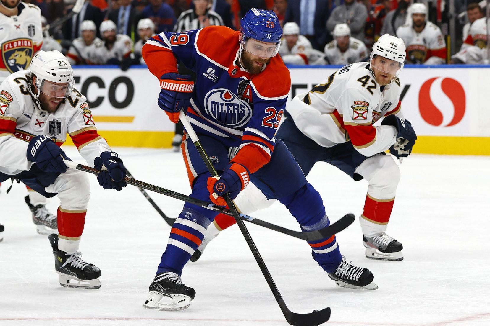 Edmonton Oilers center Leon Draisaitl (29) skates past Florida Panthers center Carter Verhaeghe (23) in game two of the 2025 Stanley Cup Final at Rogers Place.