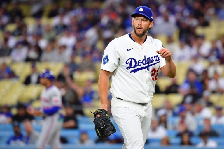 Los Angeles Dodgers pitcher Clayton Kershaw (22) reacts against the New York Mets  during the first inning at Dodger Stadium.