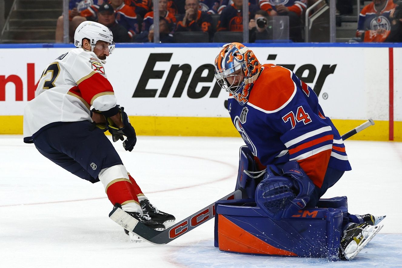 Florida Panthers center Brad Marchand (63) shoots the puck on Edmonton Oilers goaltender Stuart Skinner (74) during the first period in game two of the 2025 Stanley Cup Final at Rogers Place.