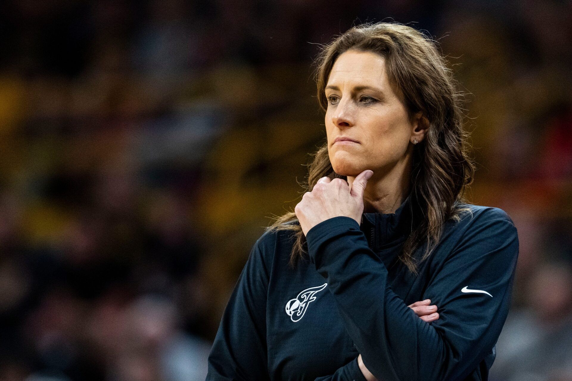Indiana Fever head coach Stephanie White watches the action Sunday, May 4, 2025, during a preseason game between the Indiana Fever and the Brazil national team at Carver-Hawkeye Arena in Iowa City. The Indiana Fever defeated the Brazilian National Team, 108-44.