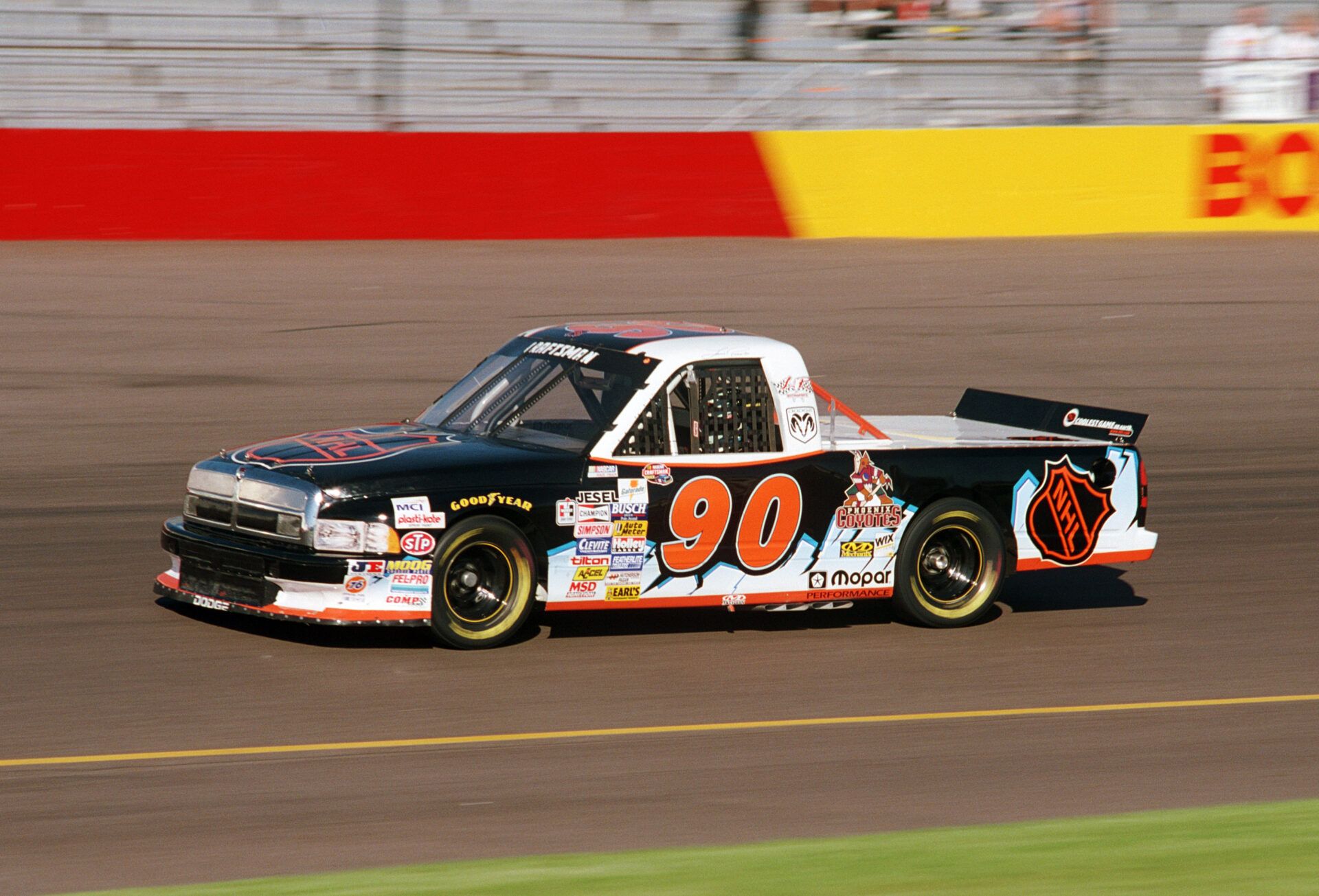 NASCAR Craftsman Truck Series driver Lance Norick (90) in the NHL Arizona Coyotes sponsored Dodge Ram during the GM Goodwrench/Delco 300 at Phoenix International Raceway.