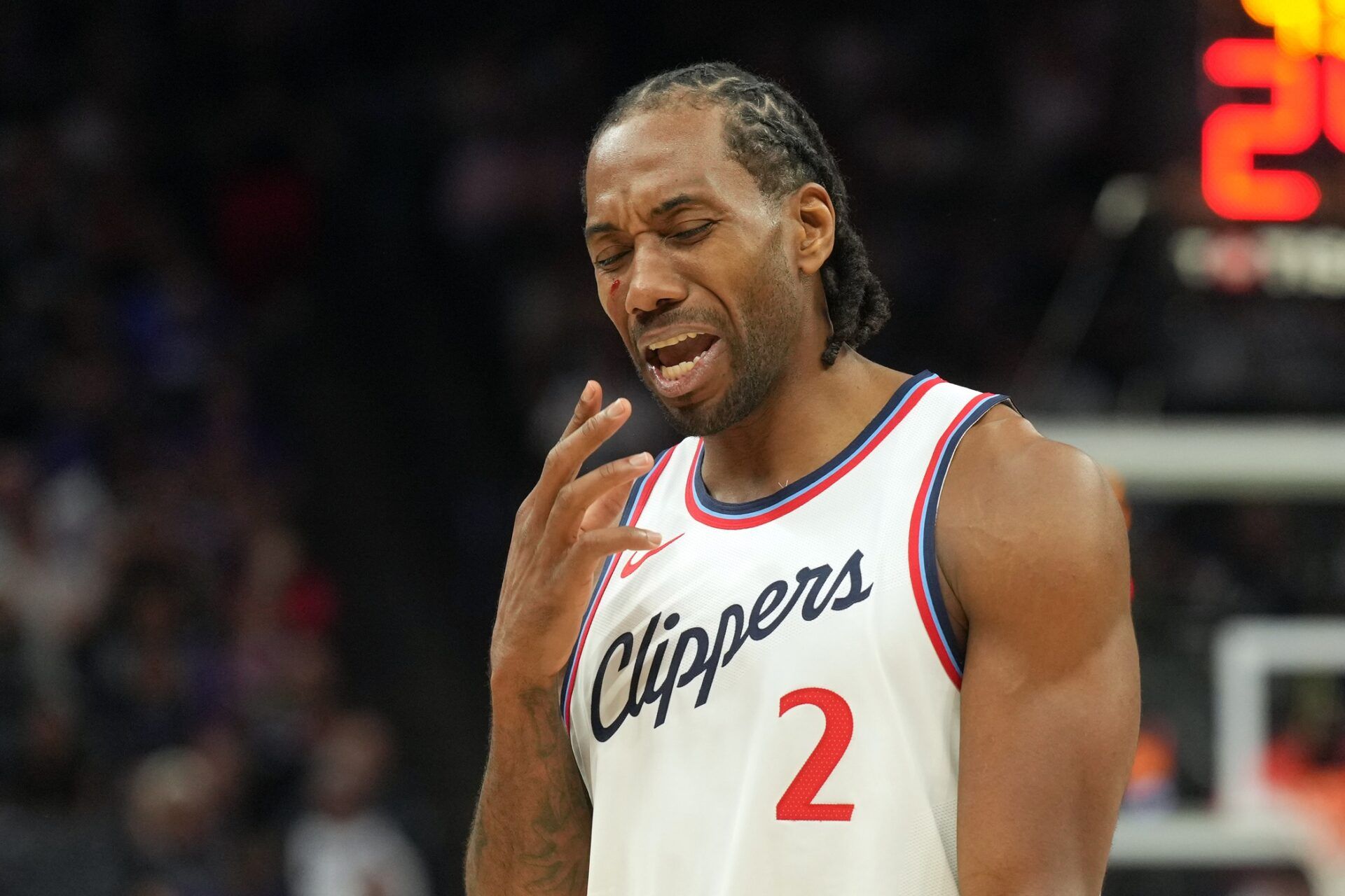 Los Angeles Clippers forward Kawhi Leonard (2) reacts after incurring a facial cut during the fourth quarter against the Sacramento Kings at Golden 1 Center.