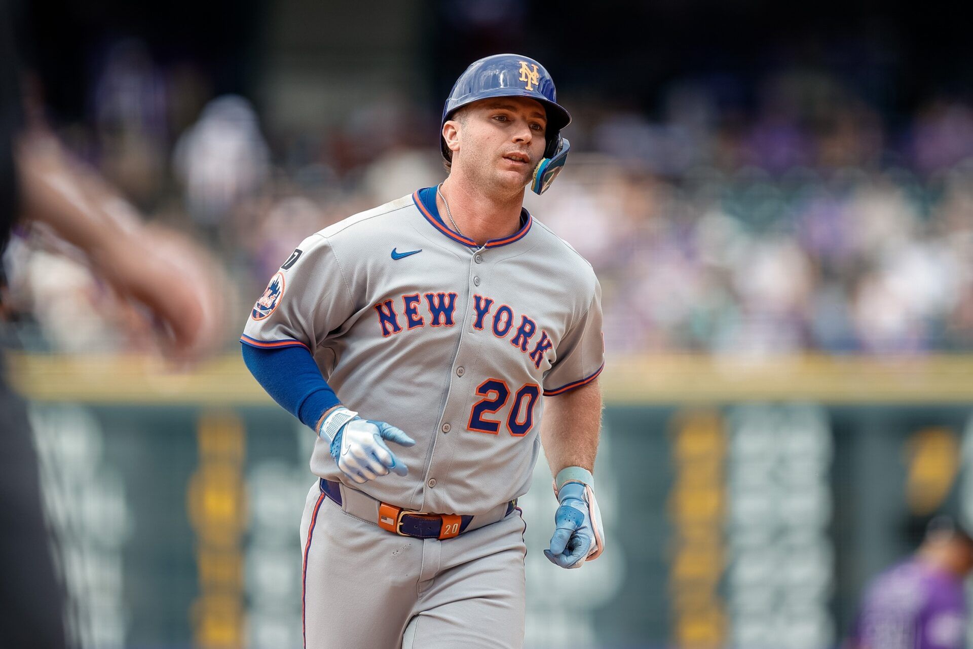 New York Mets first baseman Pete Alonso (20) rounds the bases on a two run home run in the eighth inning against the Colorado Rockies at Coors Field.