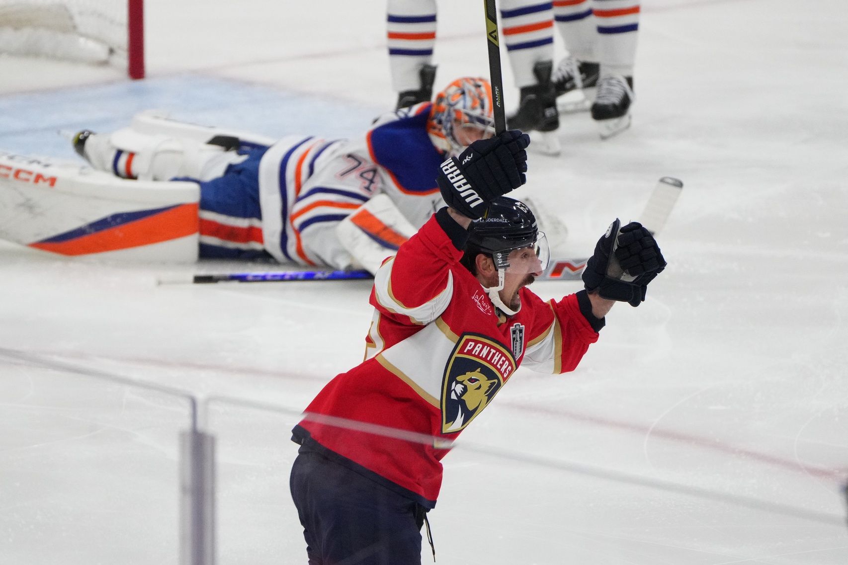 Florida Panthers forward Brad Marchand (63) celebrates scoring against Edmonton Oilers goaltender Stuart Skinner (74) during the first period in game three of the 2025 Stanley Cup Final at Amerant Bank Arena.