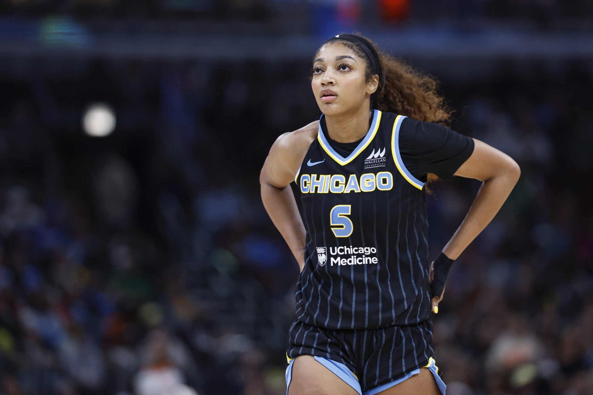 Chicago Sky forward Angel Reese (5) walks on the court during the second half of a WNBA game against the Indiana Fever at United Center.