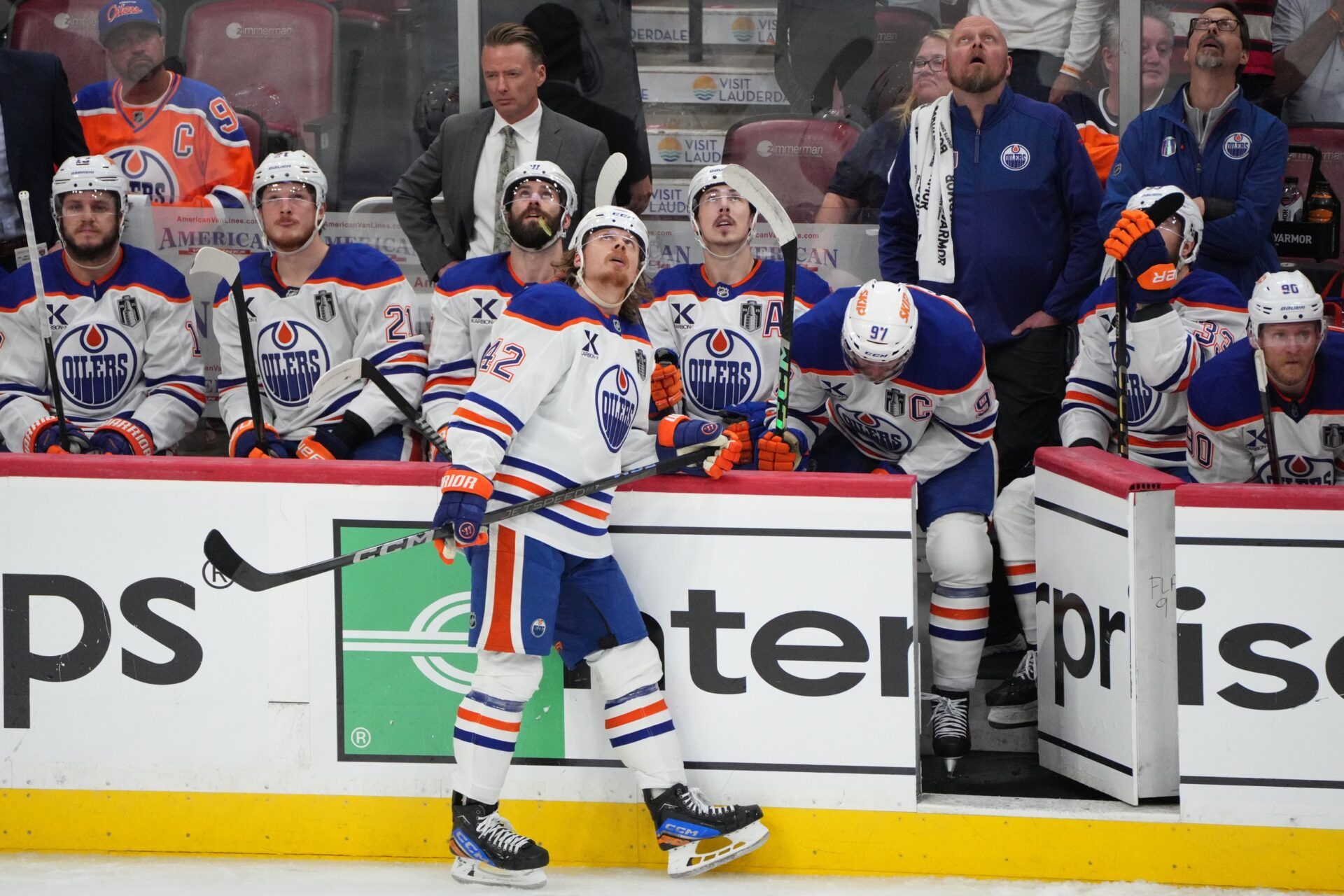 Edmonton Oilers bench looks on as the replay of Florida Panthers defenseman Aaron Ekblad (5) (not pictured) goal is replayed during the third period in game three of the 2025 Stanley Cup Final at Amerant Bank Arena.