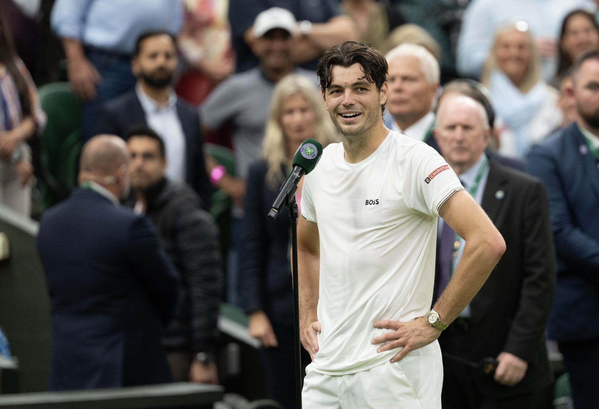 Taylor Fritz of the United States at his on court interview after winning his match against Alexander Zverev of Germany (not shown) on day eight of The Championships at All England Lawn Tennis and Croquet Club.