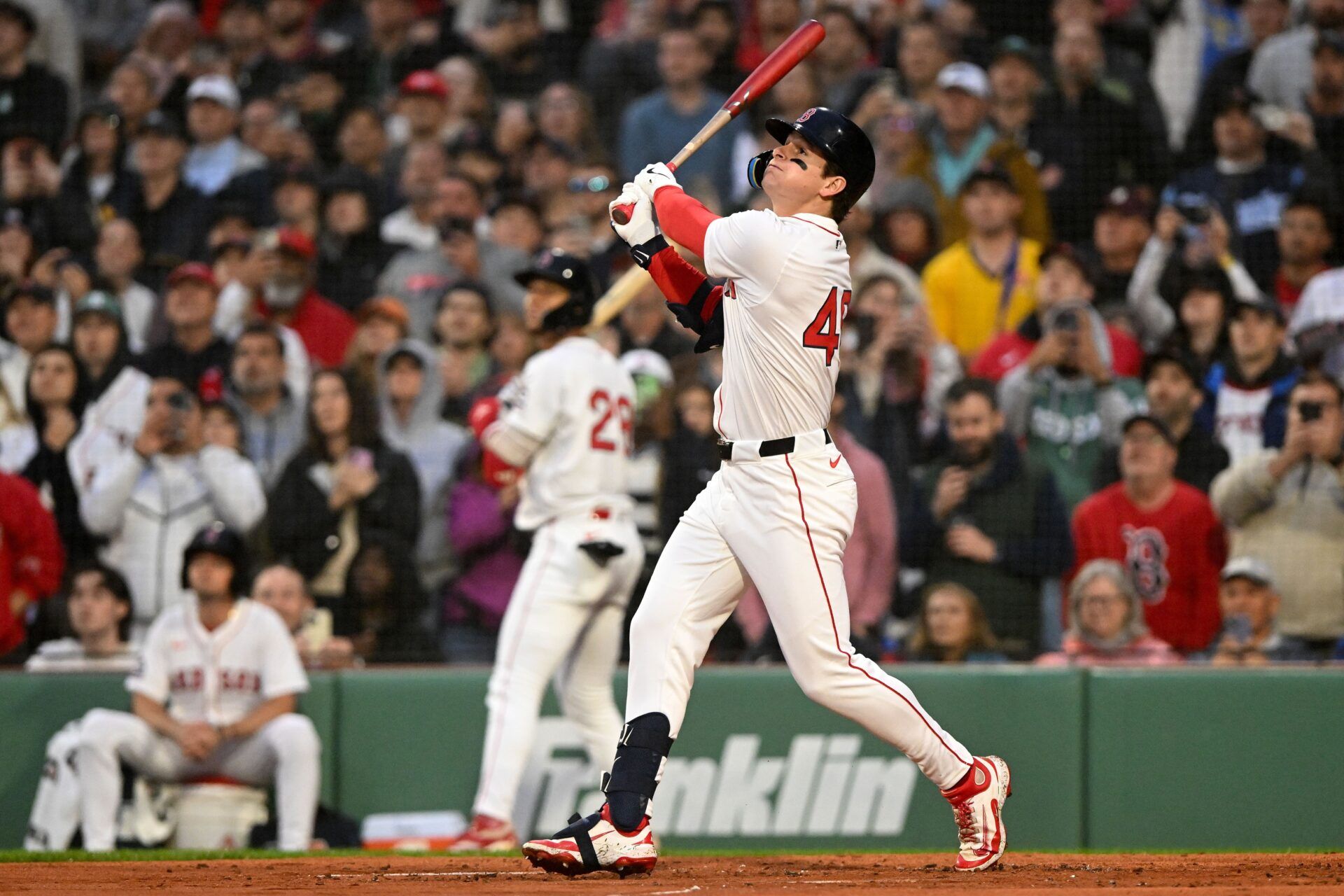 Boston Red Sox right fielder Roman Anthony (48) hits a fly out to left field during the second inning of a game against the Tampa Bay Rays at Fenway Park.
