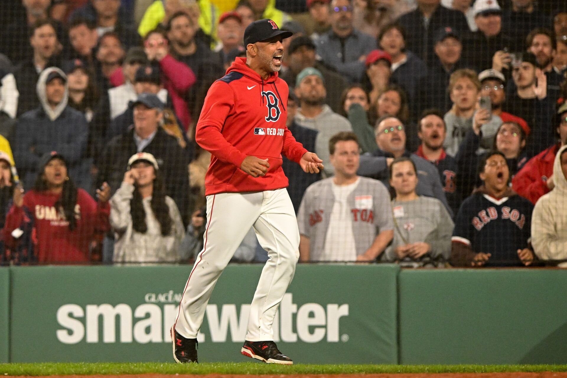 Boston Red Sox manger Alex Cora reacts after a strike out during the eleventh inning of a game against the Tampa Bay Rays at Fenway Park.