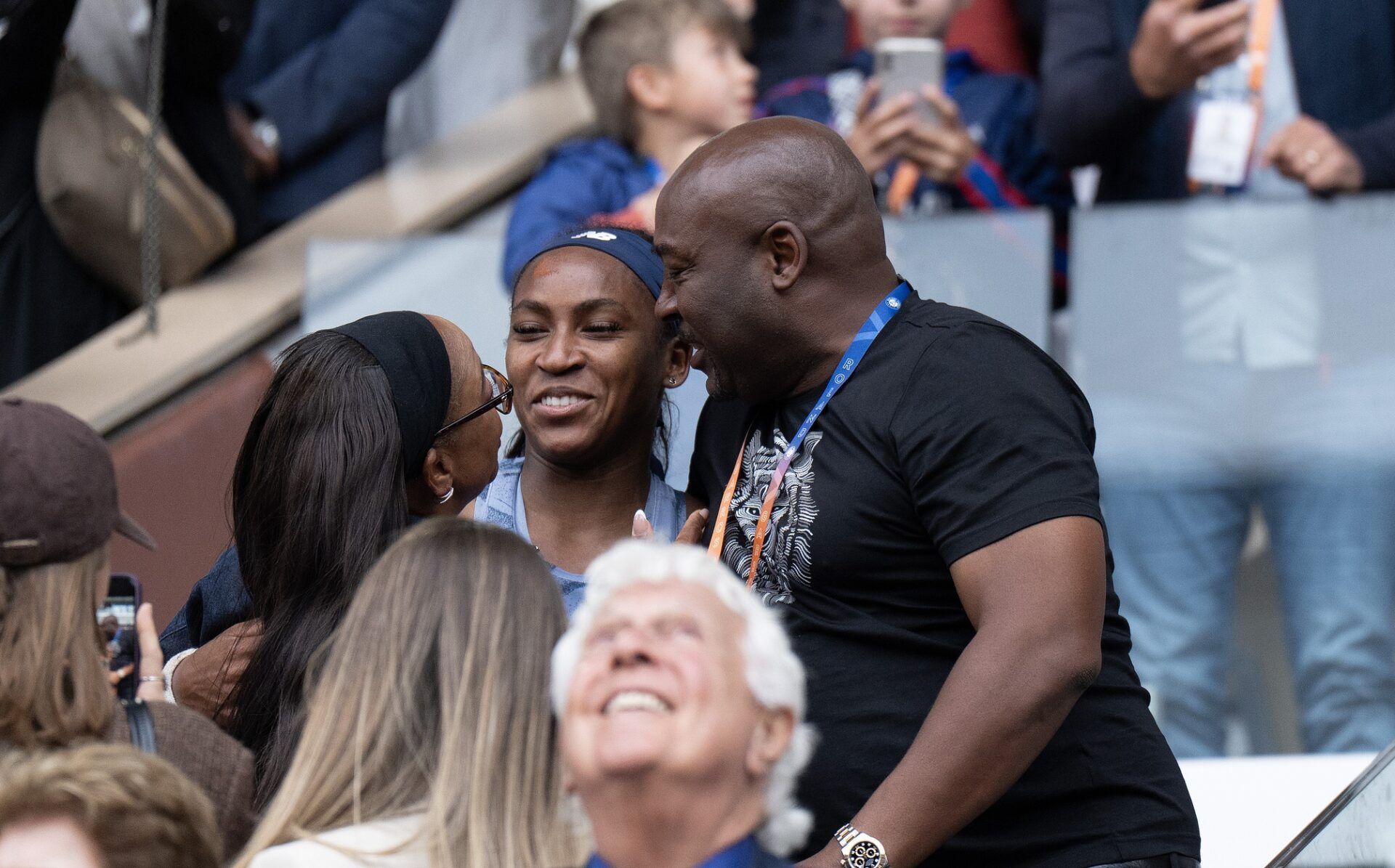 Coco Gauff of the United States celebrates with her parents, Candi and Corey Gauff, after winning the womenÕs singles final against Aryna Sabalenka on day 14 at Roland Garros Stadium.