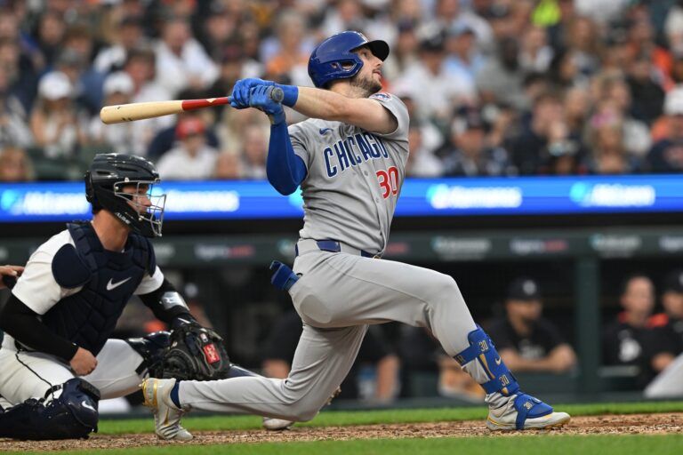 Chicago Cubs right fielder Kyle Tucker (30) hits an RBI double against the Detroit Tigers in the sixth inning at Comerica Park.
