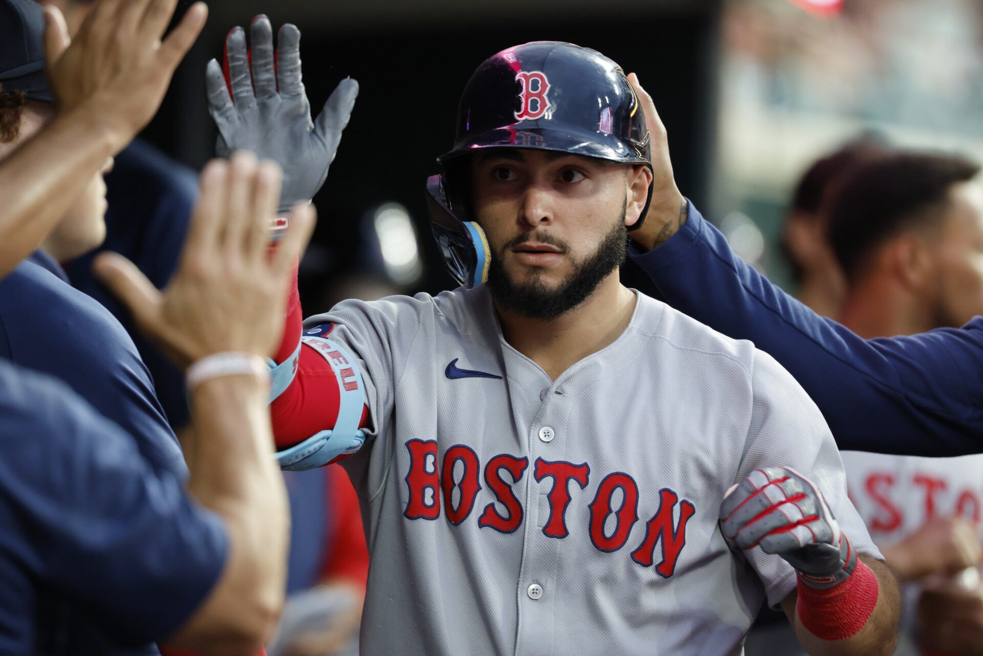 Boston Red Sox outfielder Wilyer Abreu (52) receives congratulations from teammates after he hits a home run sixth inning against the Detroit Tigers at Comerica Park.