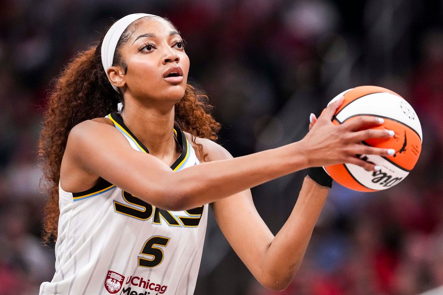 Chicago Sky forward Angel Reese (5) looks to shoot a basket Saturday, May 17, 2025, during a game between the Indiana Fever and the Chicago Sky at Gainbridge Fieldhouse in Indianapolis. The Indiana Fever defeated the Chicago Sky, 93-58.