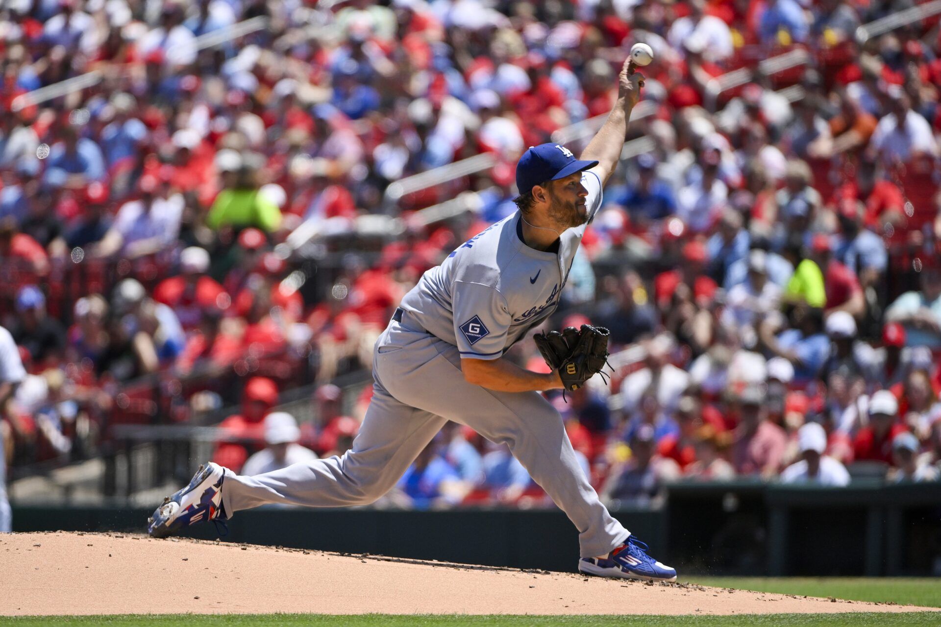 Los Angeles Dodgers starting pitcher Clayton Kershaw (22) pitches against the St. Louis Cardinals during the first inning at Busch Stadium.
