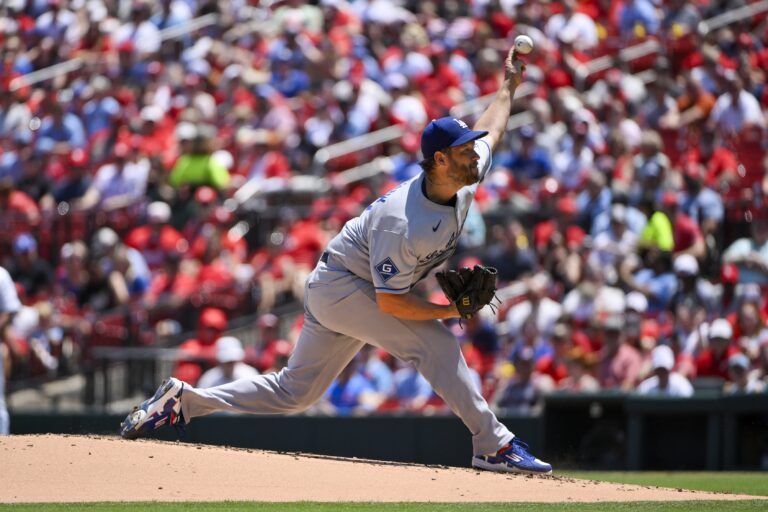 Los Angeles Dodgers starting pitcher Clayton Kershaw (22) pitches against the St. Louis Cardinals during the first inning at Busch Stadium.