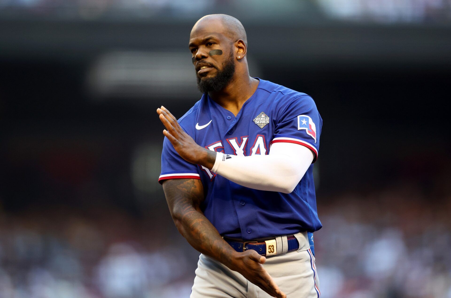 Texas Rangers right fielder Adolis Garcia (53) reacts after making the final out in the top of the first inning of game three of the 2023 World Series against the Arizona Diamondbacks at Chase Field.