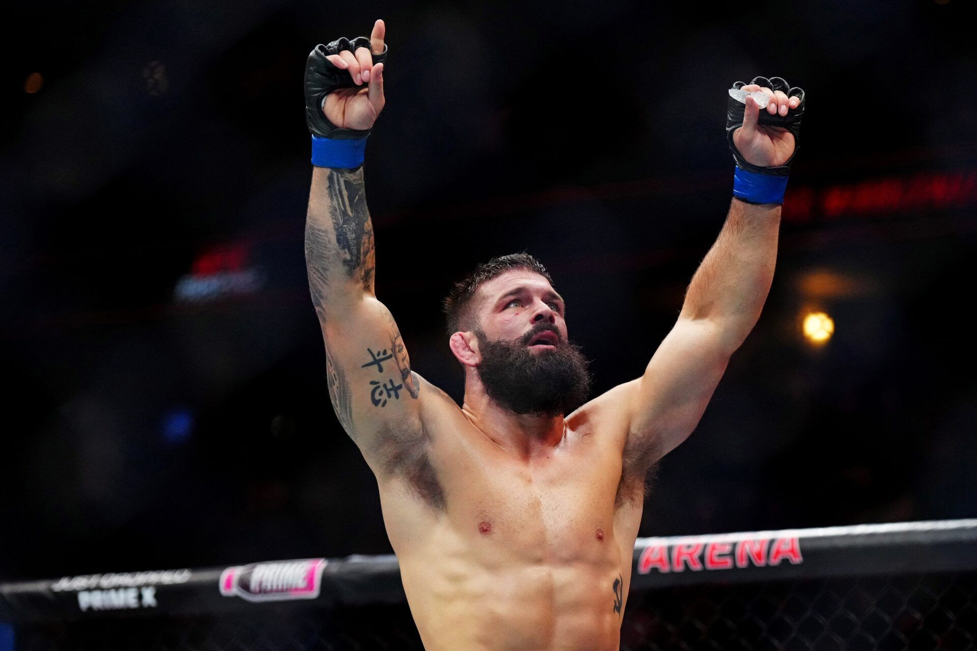 Andre Petroski (blue gloves) celebrates defeating Josh Fremd (red gloves) during UFC Fight Night at Ball Arena.