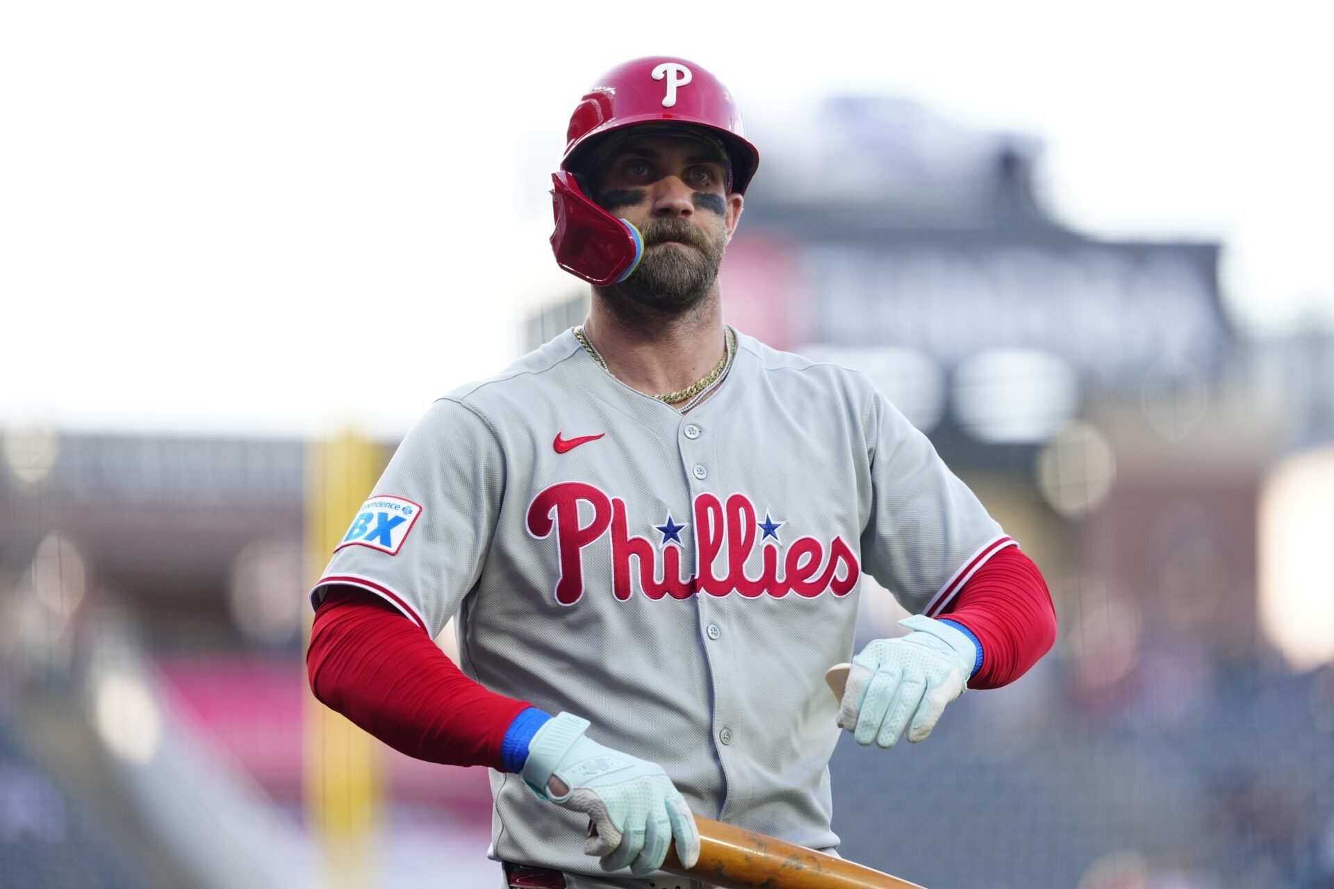 Philadelphia Phillies first base Bryce Harper (3) on deck in the first inning against the Colorado Rockies at Coors Field.