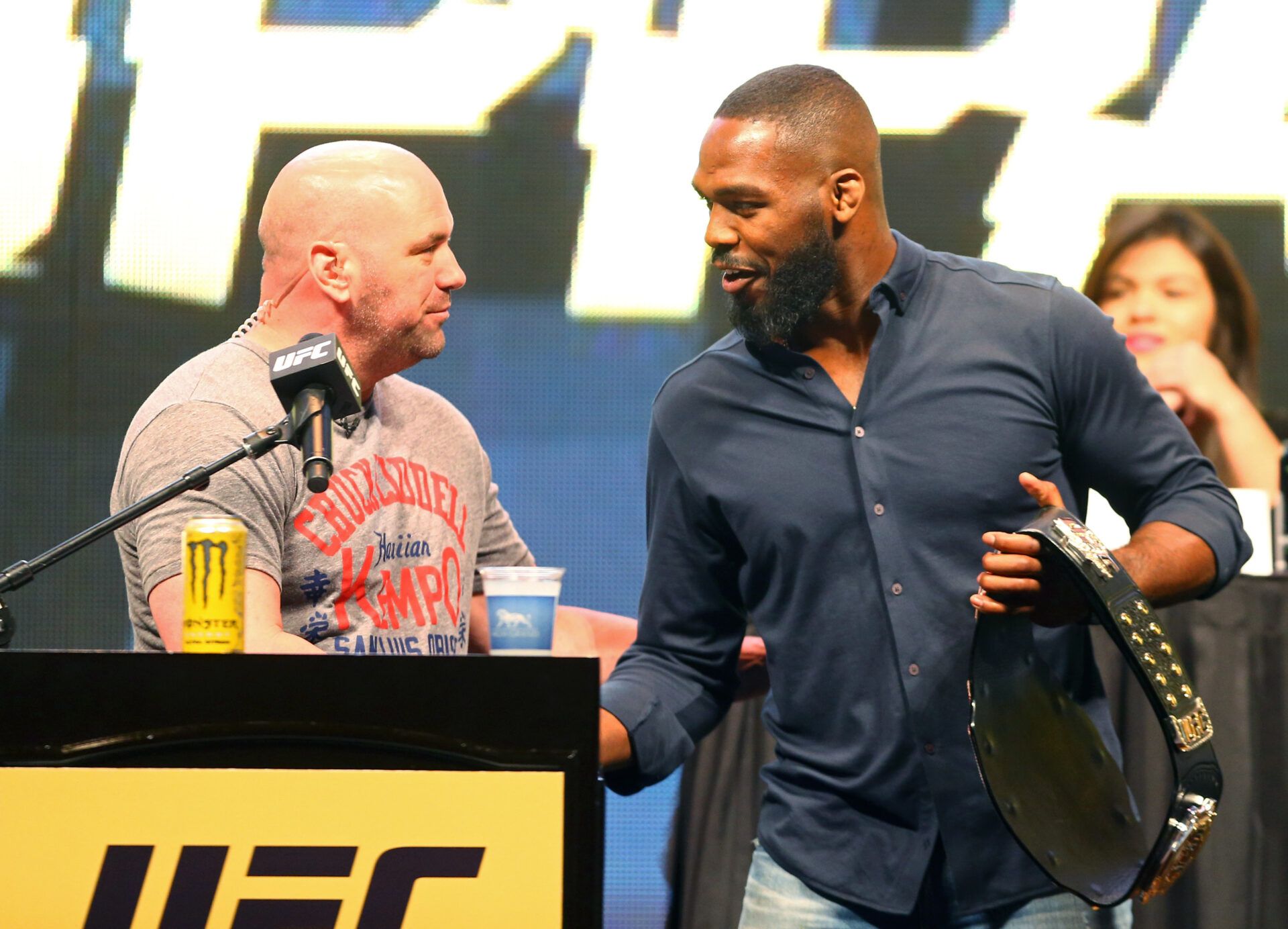 UFC president Dana White (left) greets fighter Jon Jones during a press conference prior to weigh-ins for UFC 196 at MGM Grand Garden Arena.