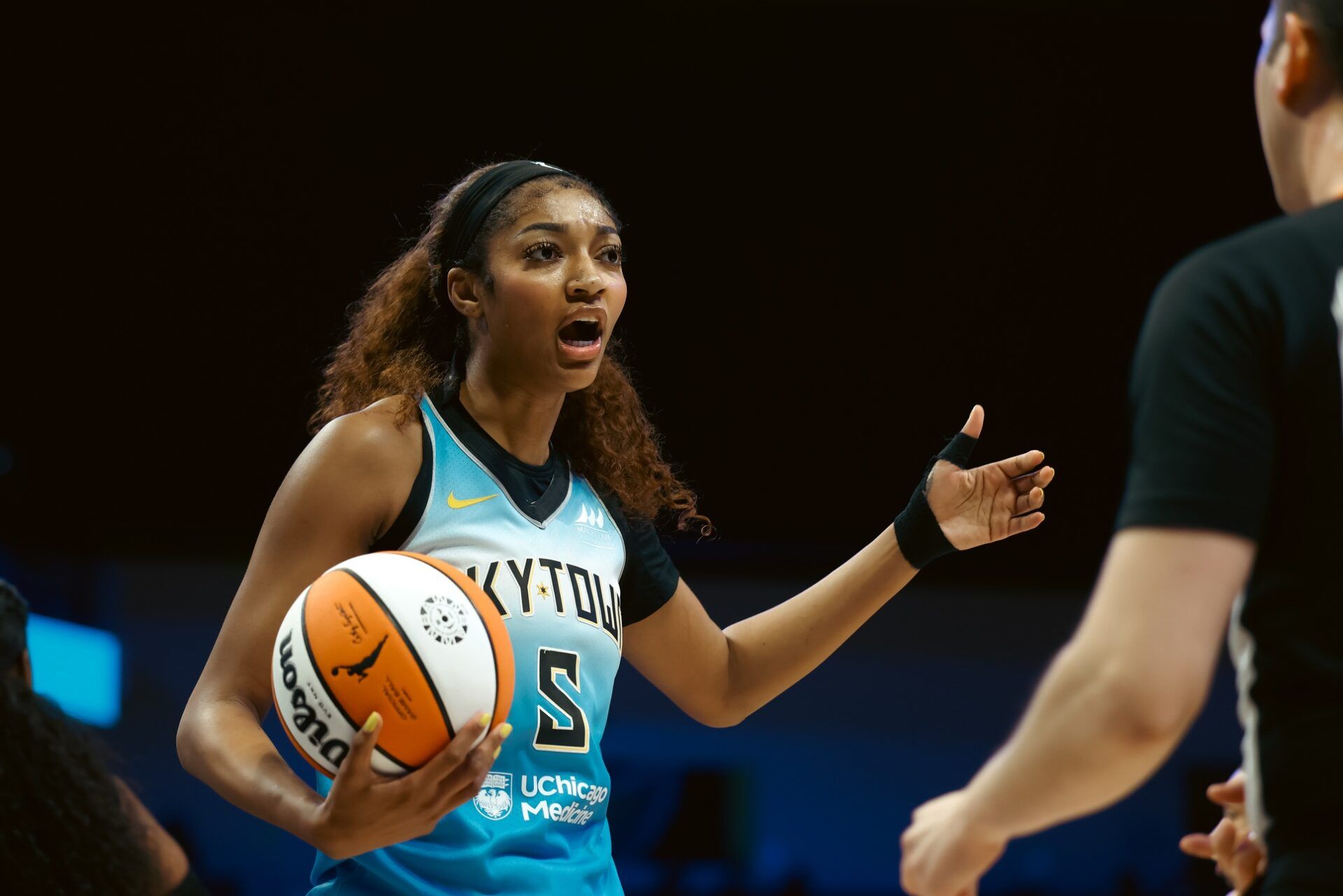 Chicago Sky forward Angel Reese (5) reacts to an official during the first half against the Dallas Wings at College Park Center.