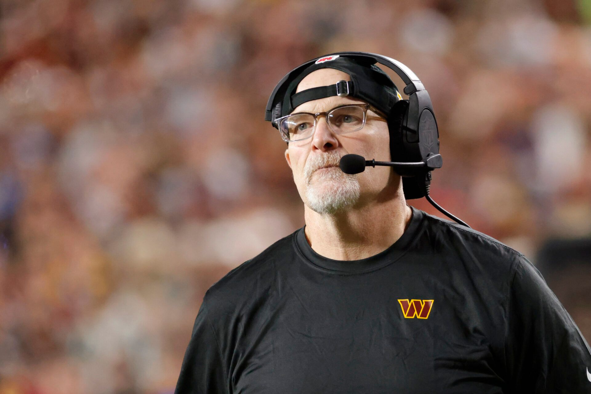 Washington Commanders head coach Dan Quinn looks on from the sidelines against the Atlanta Falcons during the second half at Northwest Stadium.