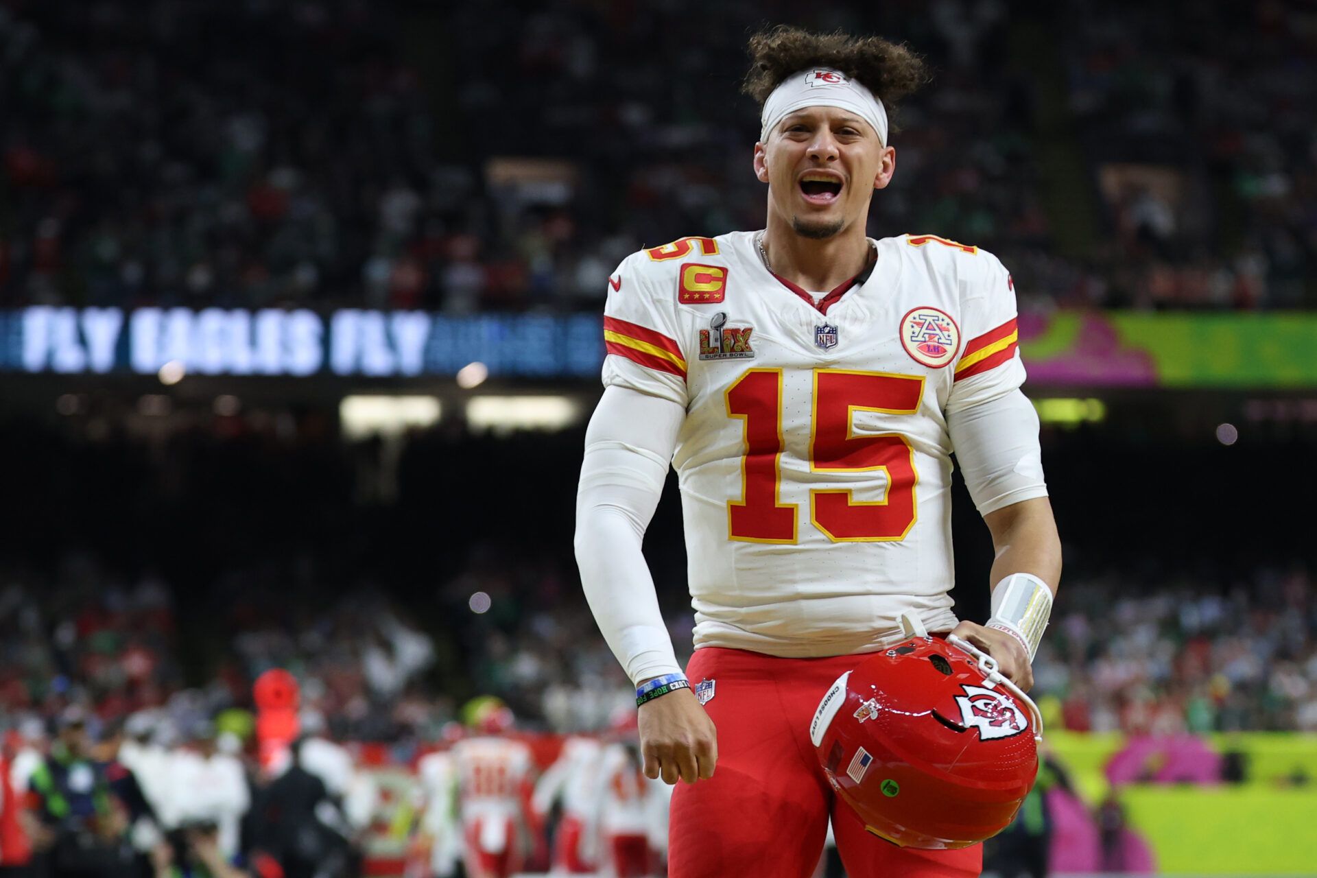 Kansas City Chiefs quarterback Patrick Mahomes (15) reacts on the field after the coin toss prior to the Chiefs' game against the Philadelphia Eagles in Super Bowl LIX at Caesars Superdome.