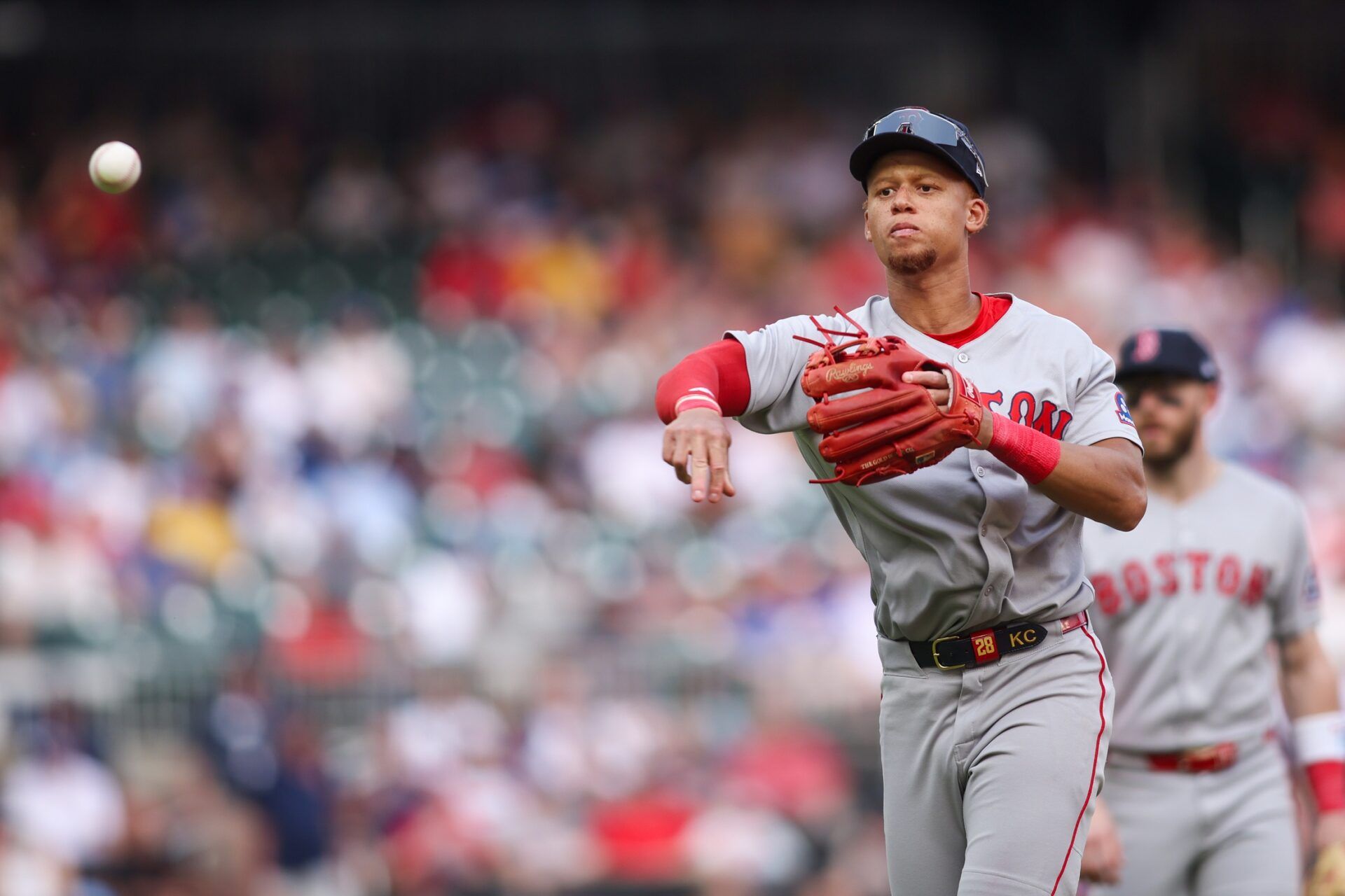 Boston Red Sox second baseman Kristian Campbell (28) throws a runner out at first against the Atlanta Braves in the eighth inning at Truist Park.