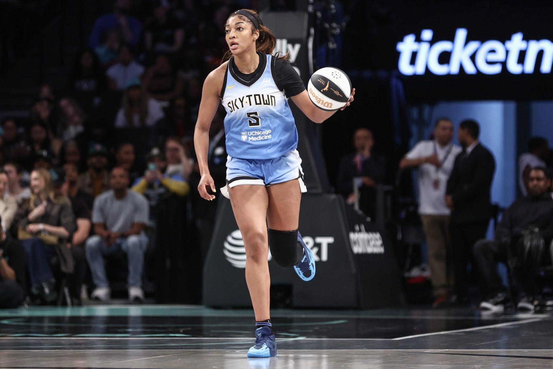 Chicago Sky forward Angel Reese (5) brings the ball up court in the first quarter against the New York Liberty at Barclays Center.